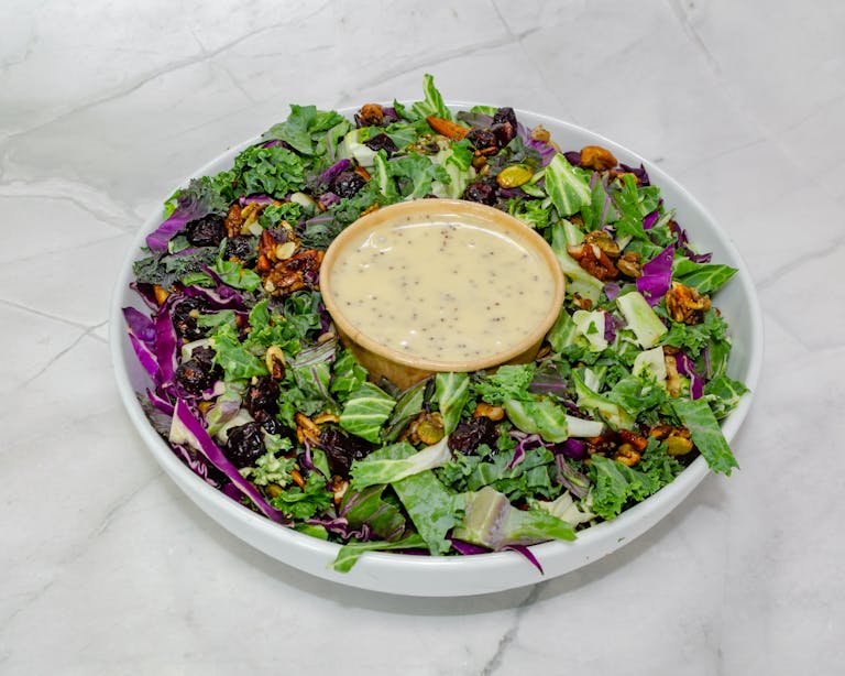a bowl of salad on a plate