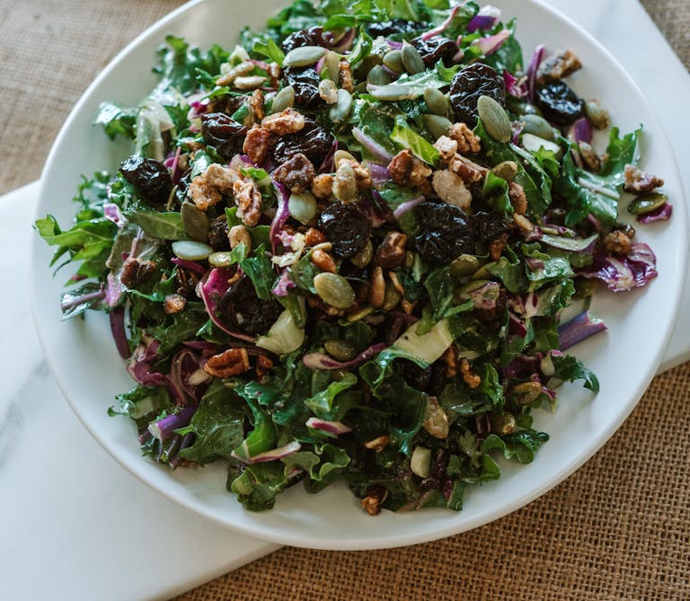 a bowl of salad on a plate