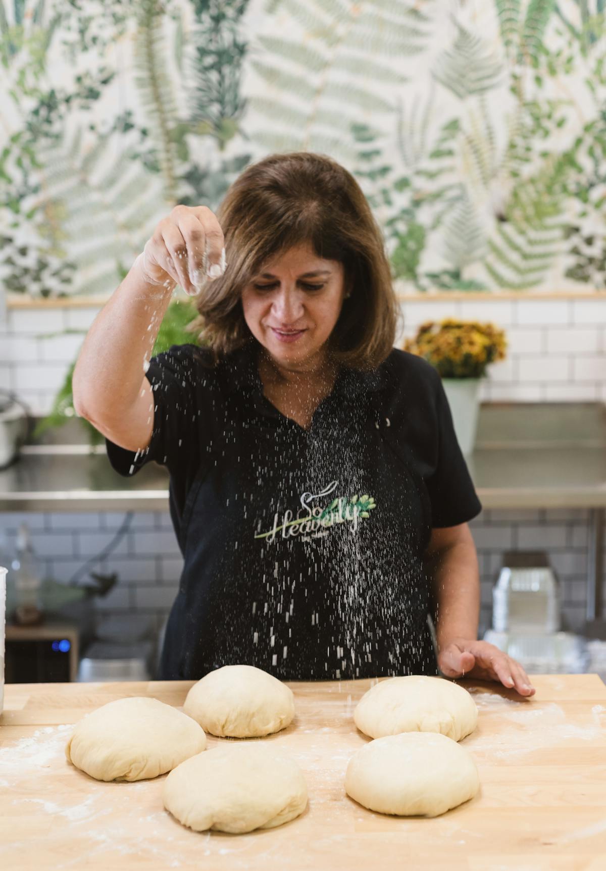a woman sitting on a counter