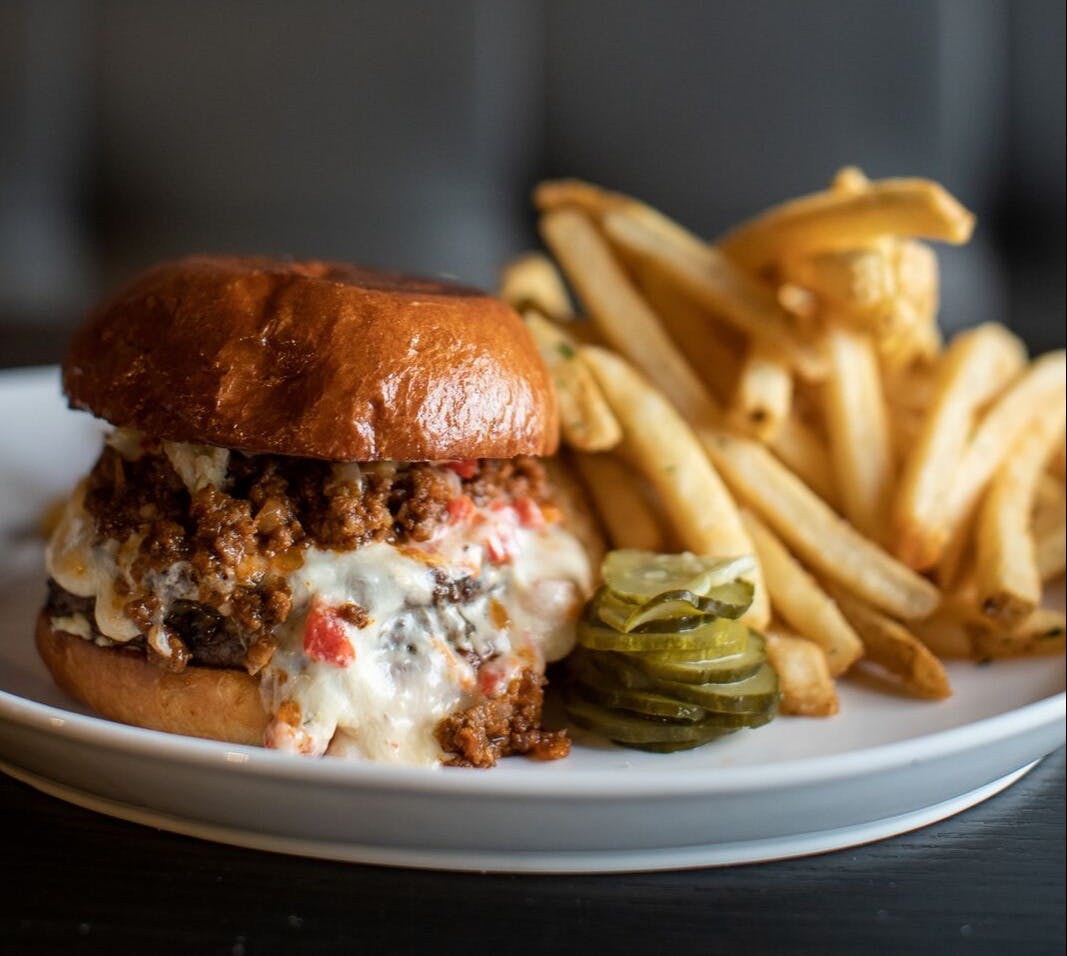 a sandwich sitting on top of a plate of food