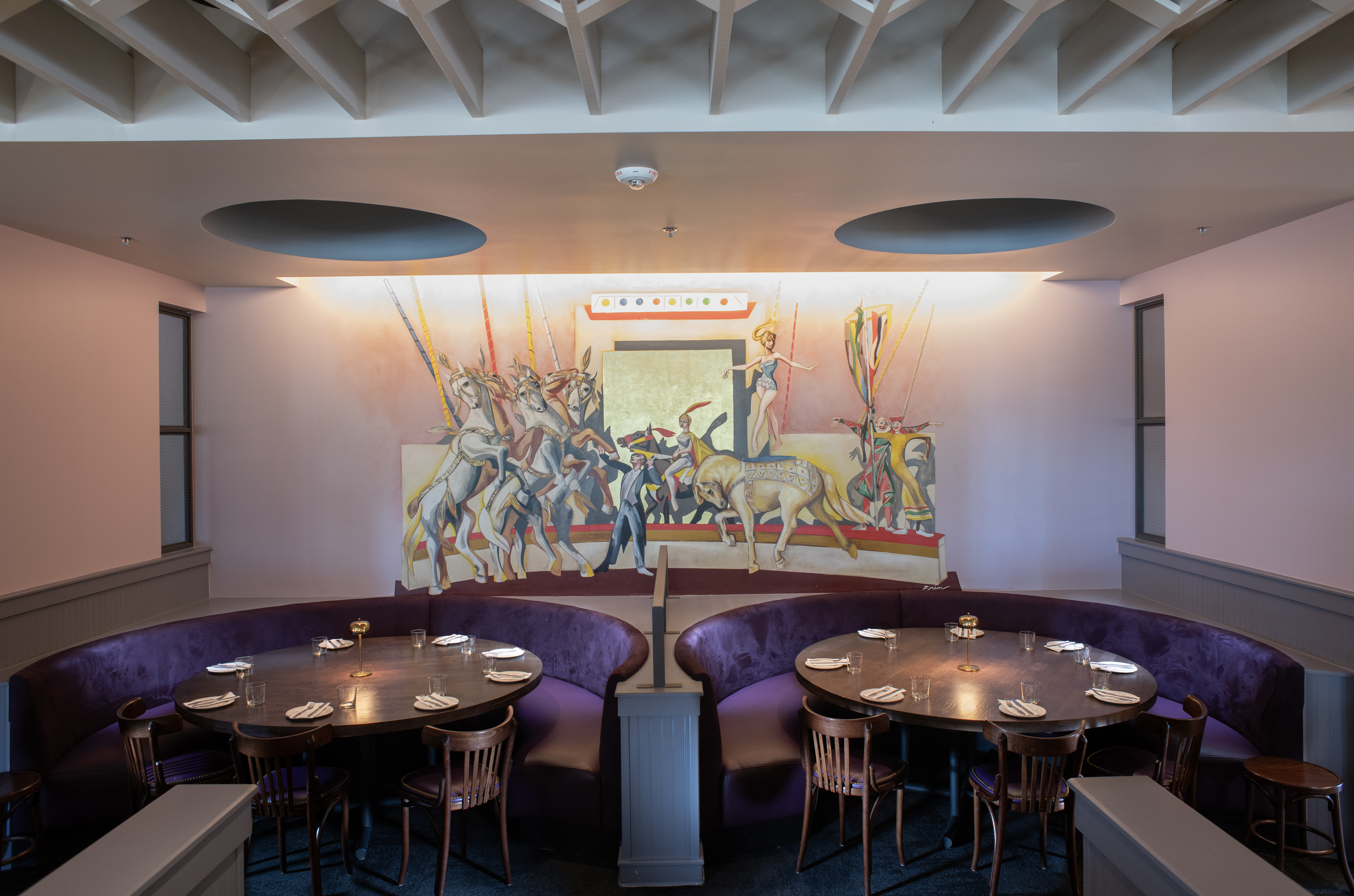 a room filled with furniture and a table