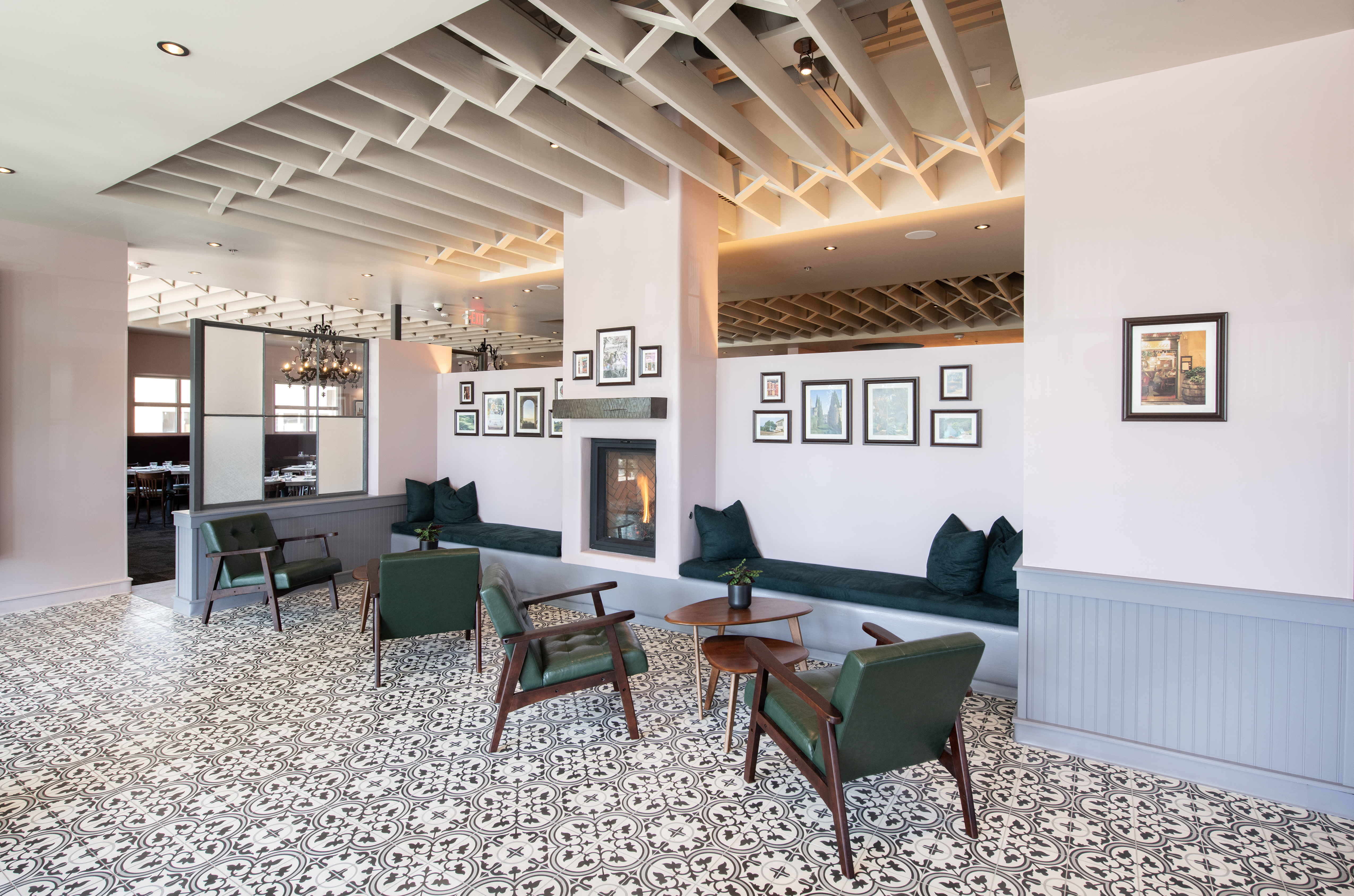 a living room filled with furniture and a large window