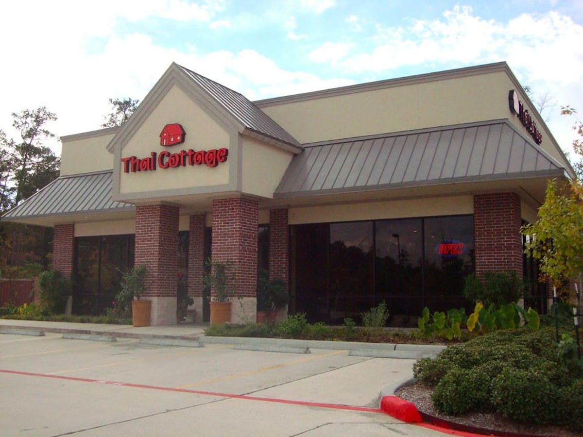 restaurant's front entrance with big windows at day