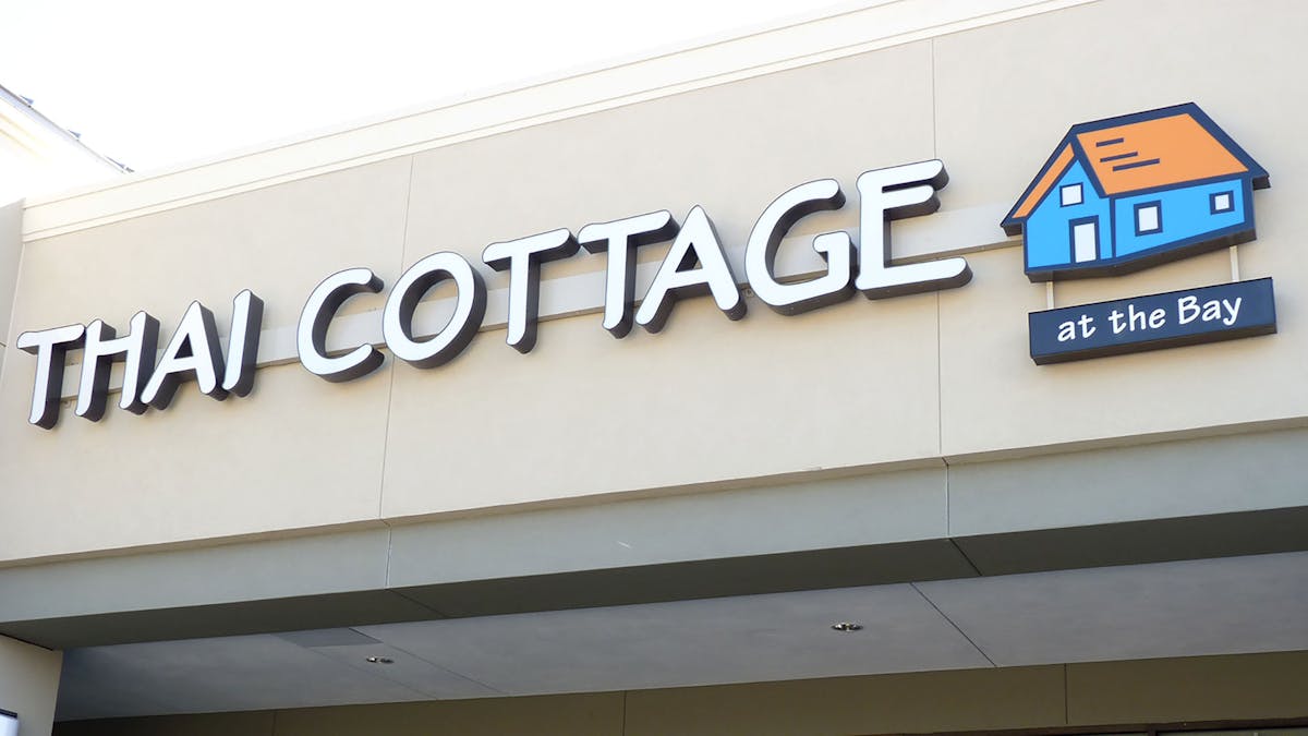 a sign on the side of a building
