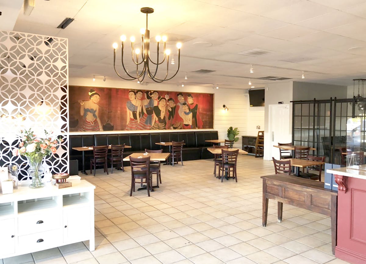 a room filled with furniture and a fireplace