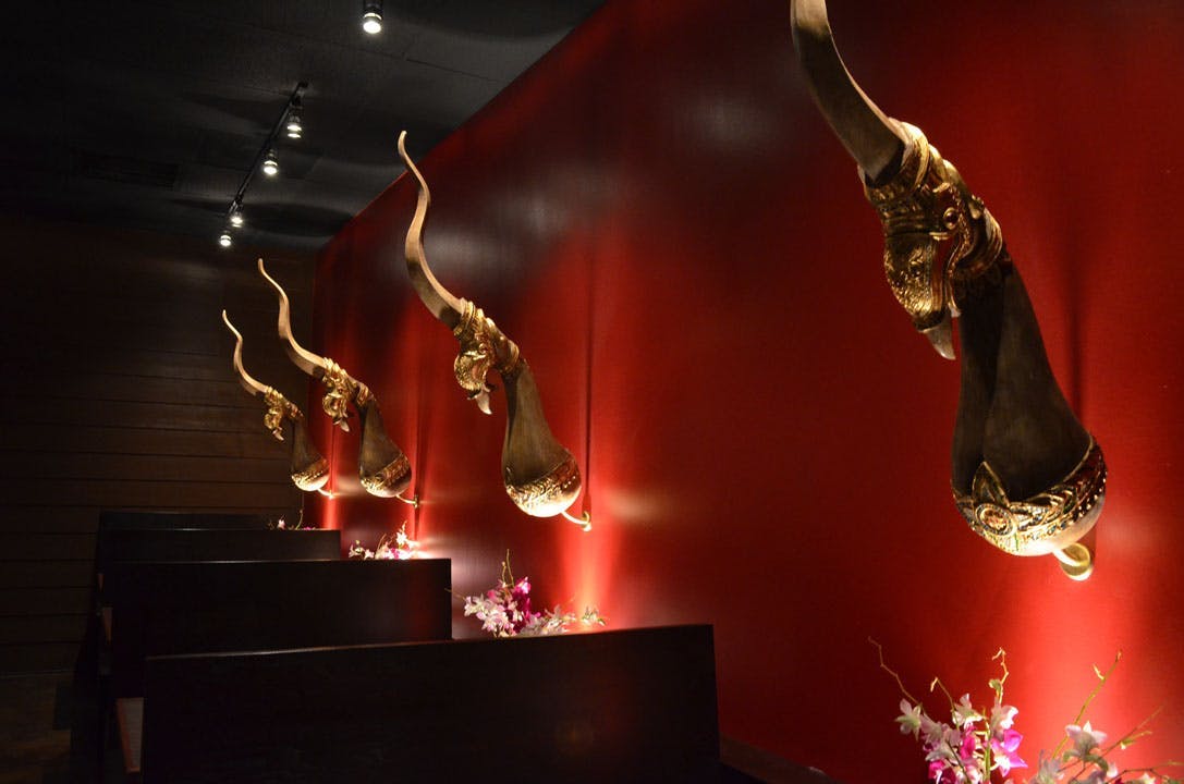several sculptures hanged on the wall