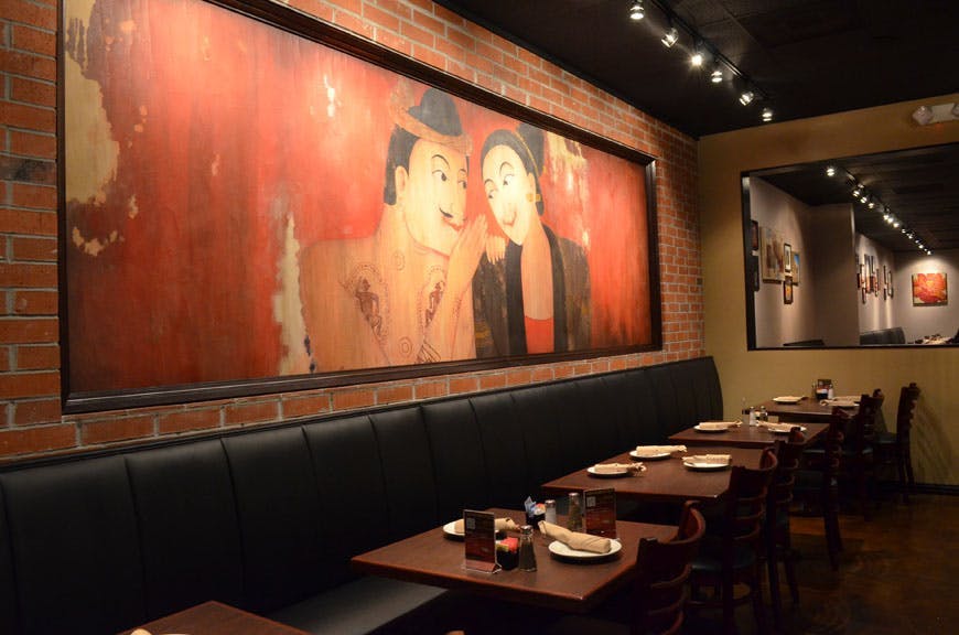 a room with a large wall painting