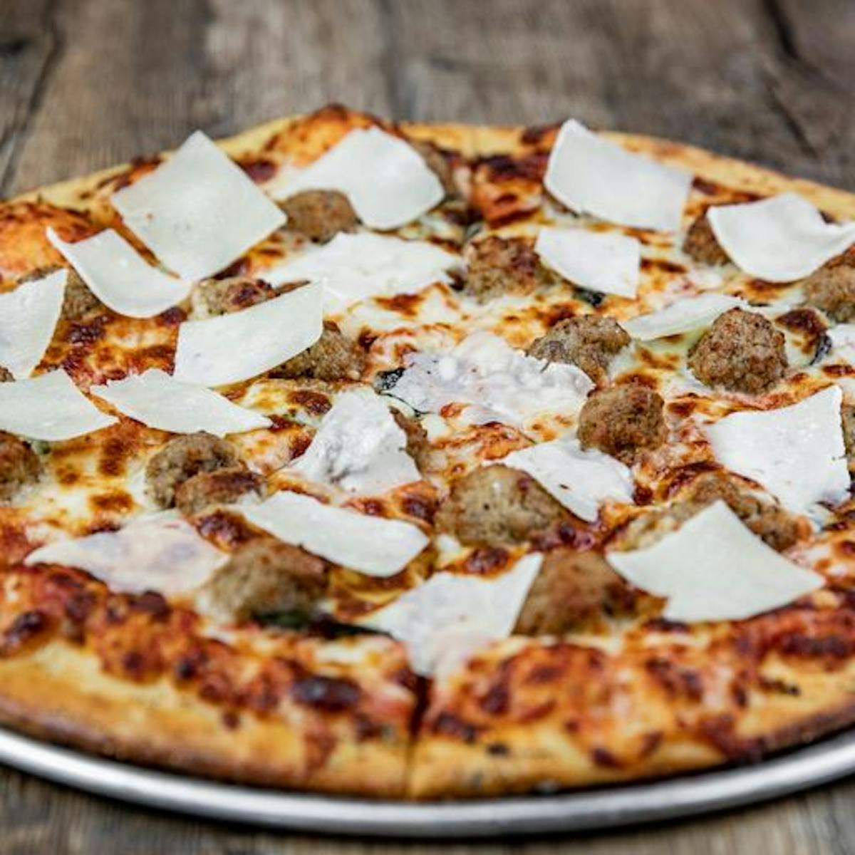 a pizza sitting on top of a table