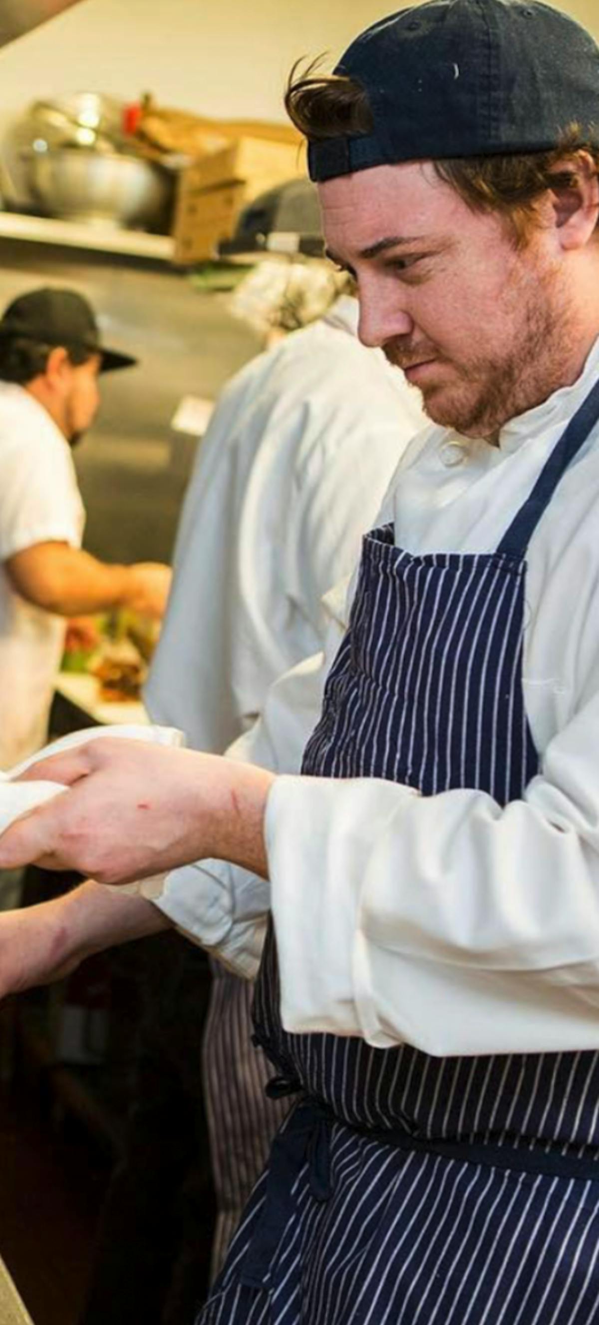 a man preparing food inside of it