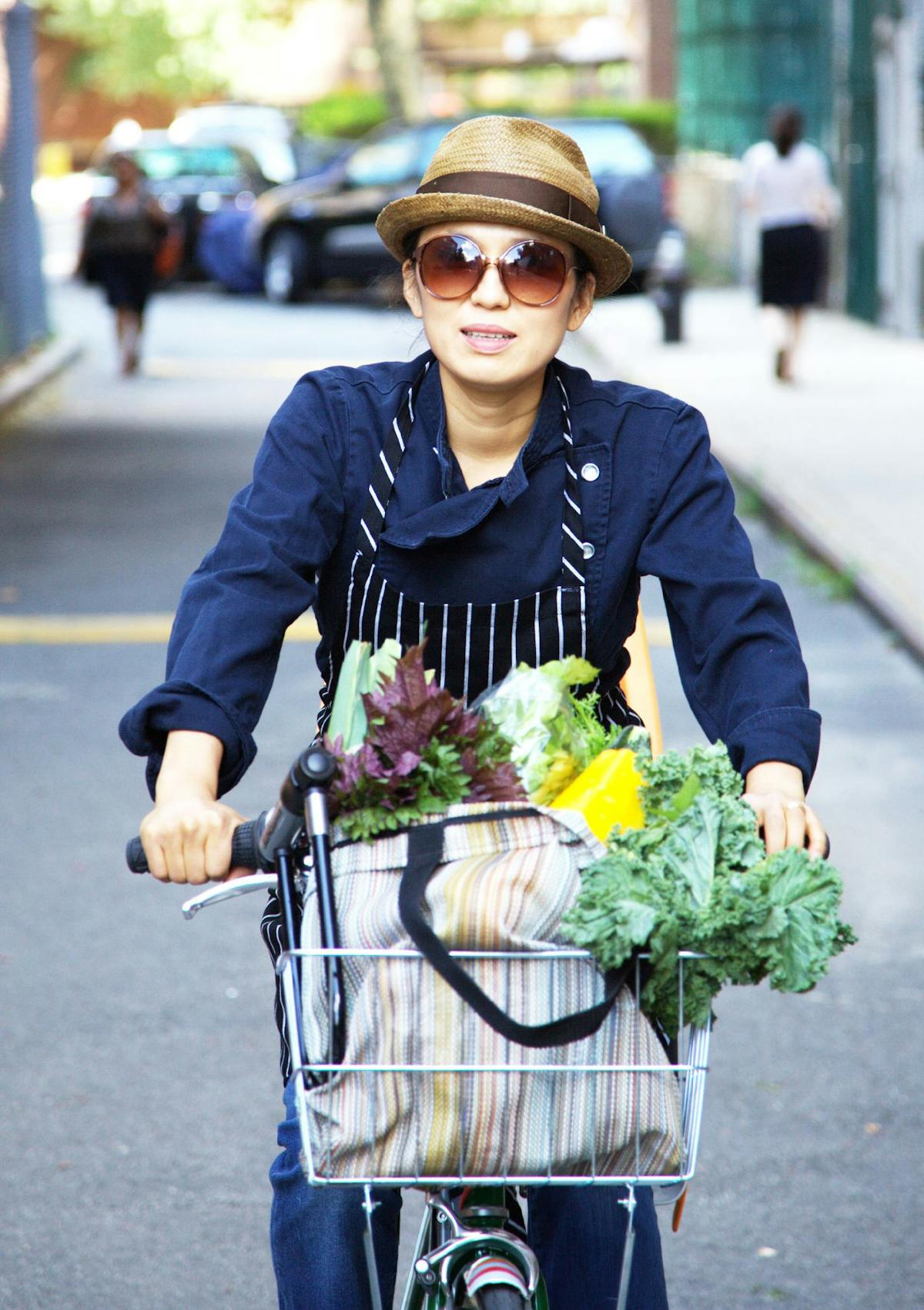 a person holding a bicycle