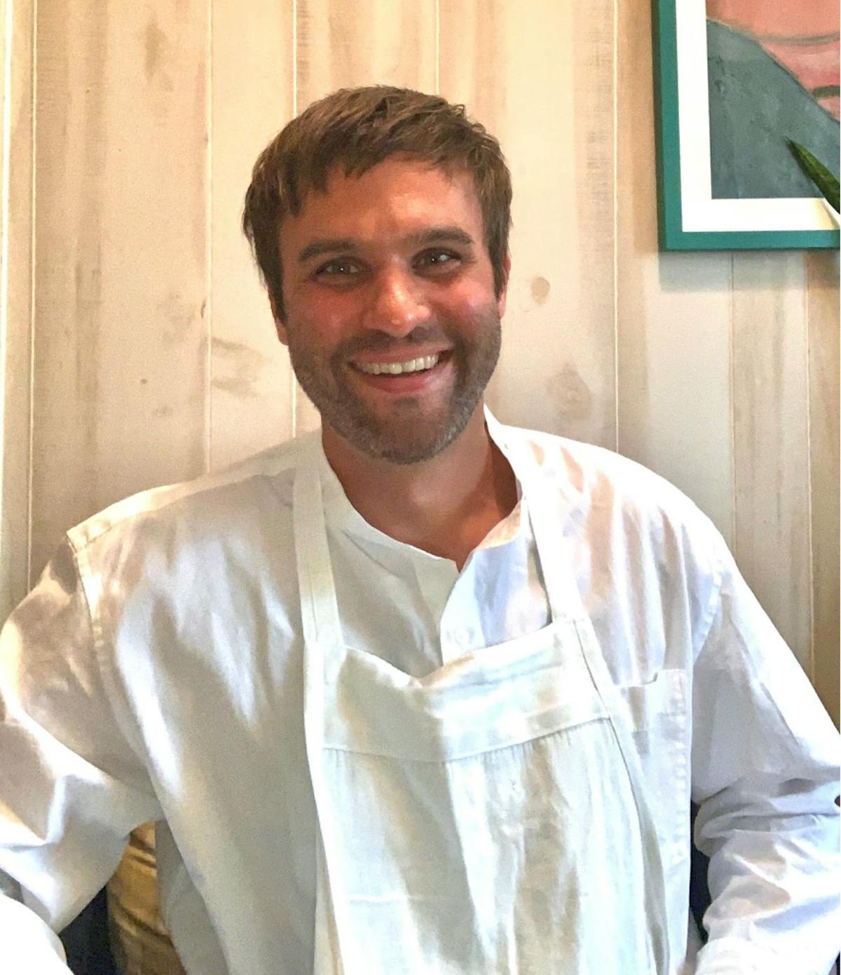 a man smiling for the camera