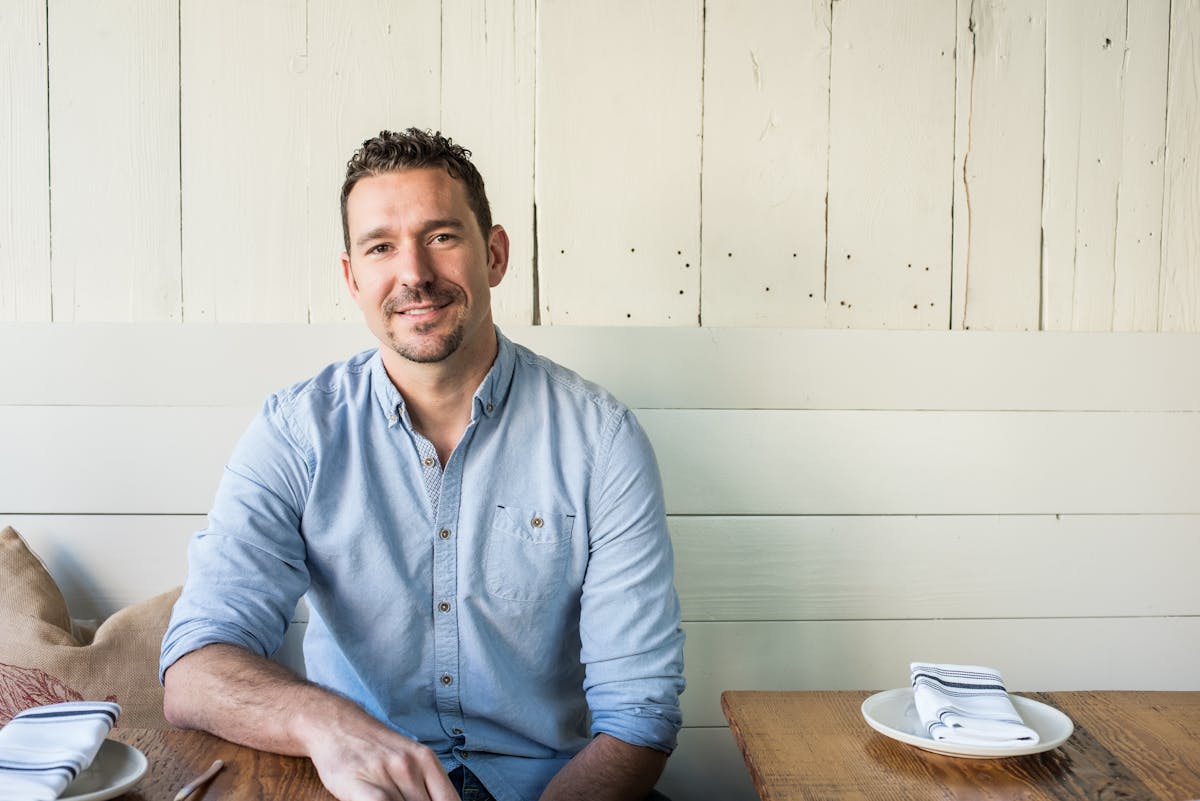 a man sitting on a table