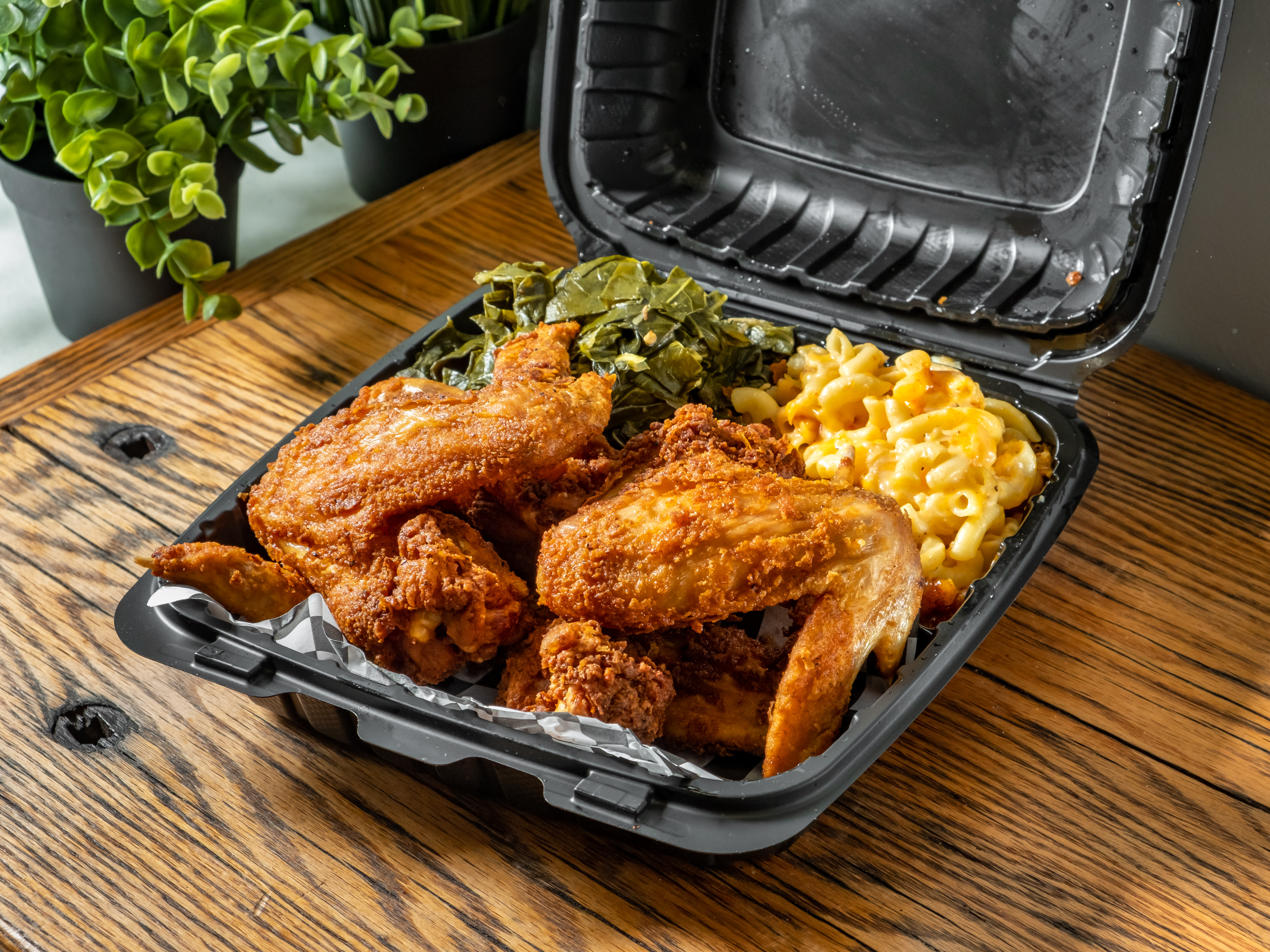 a tray of food on a wooden table
