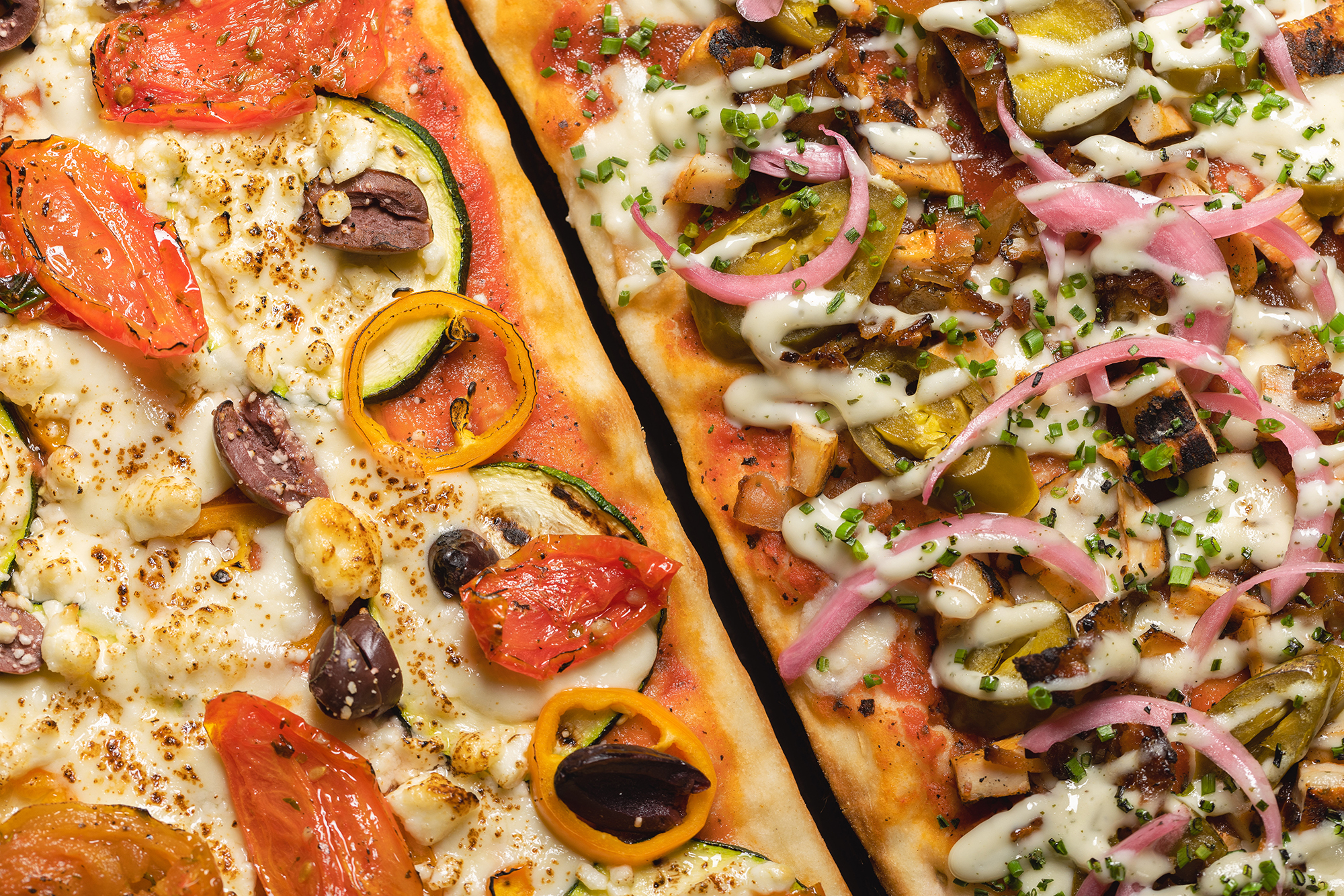 Ranch Chicken and Mediterranean flatbread pizzas at The Independent in Times Square