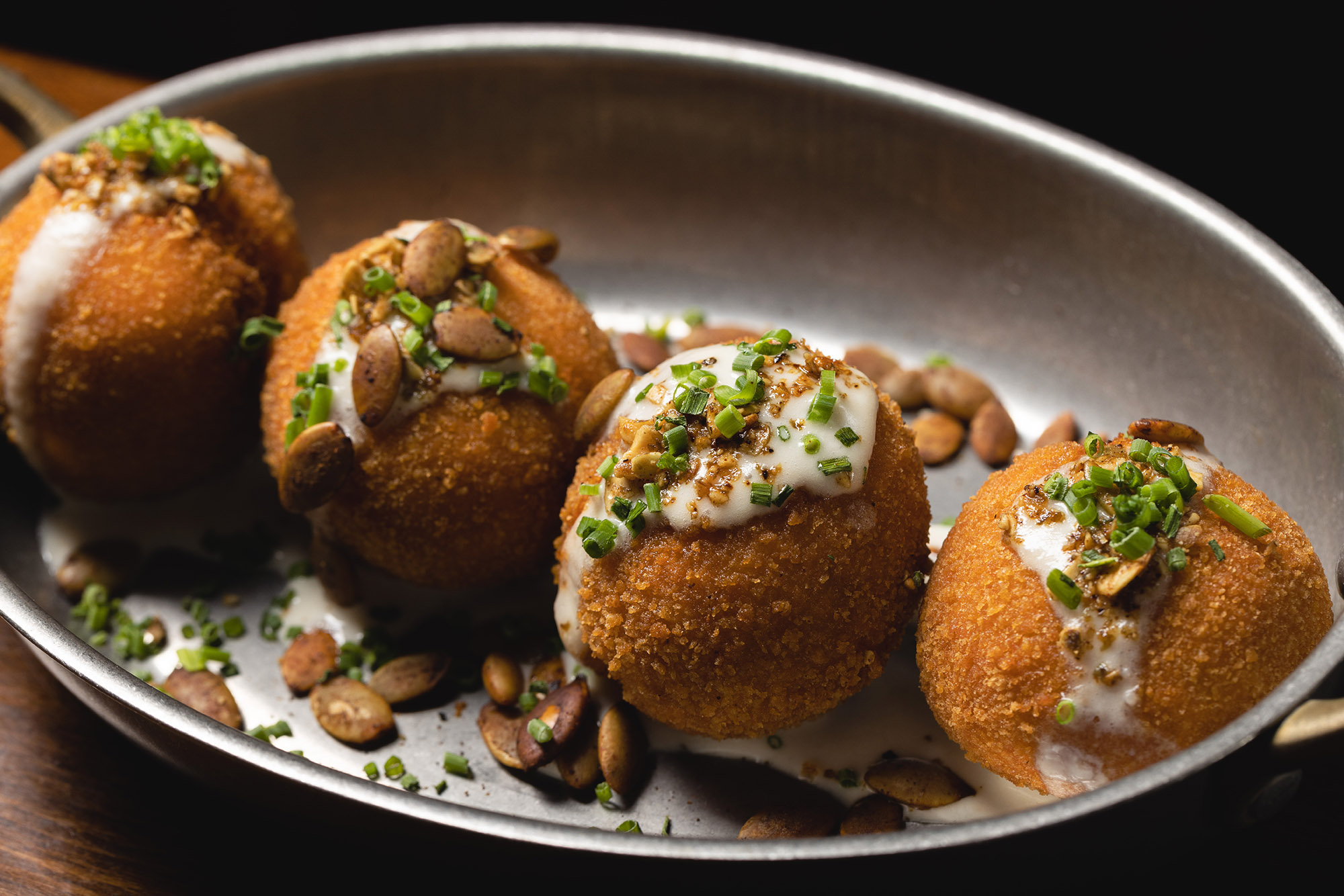 Close up of The Independent's Sweet Potato Croquettes in Midtown Manhattan