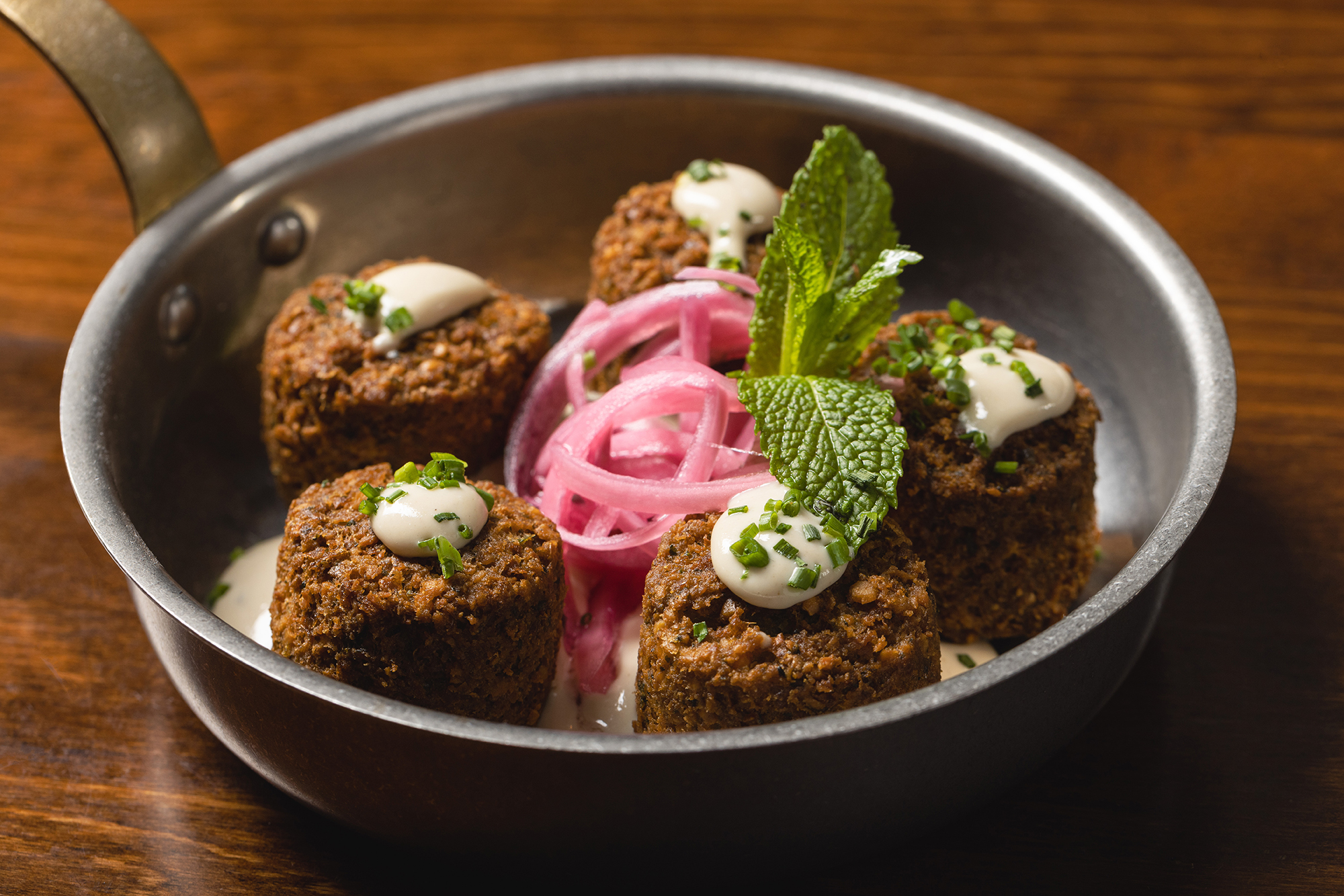 Share some Falafel Tots with the whole table at The Independent by the Theatre District