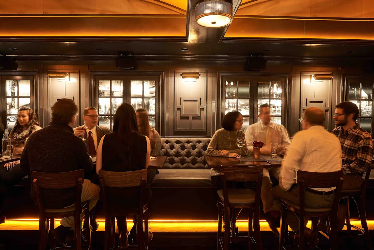 people chatting during happy hour at the Independent after work, pre theatre