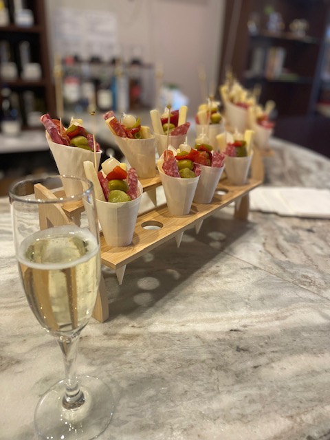 a glass of wine on a table