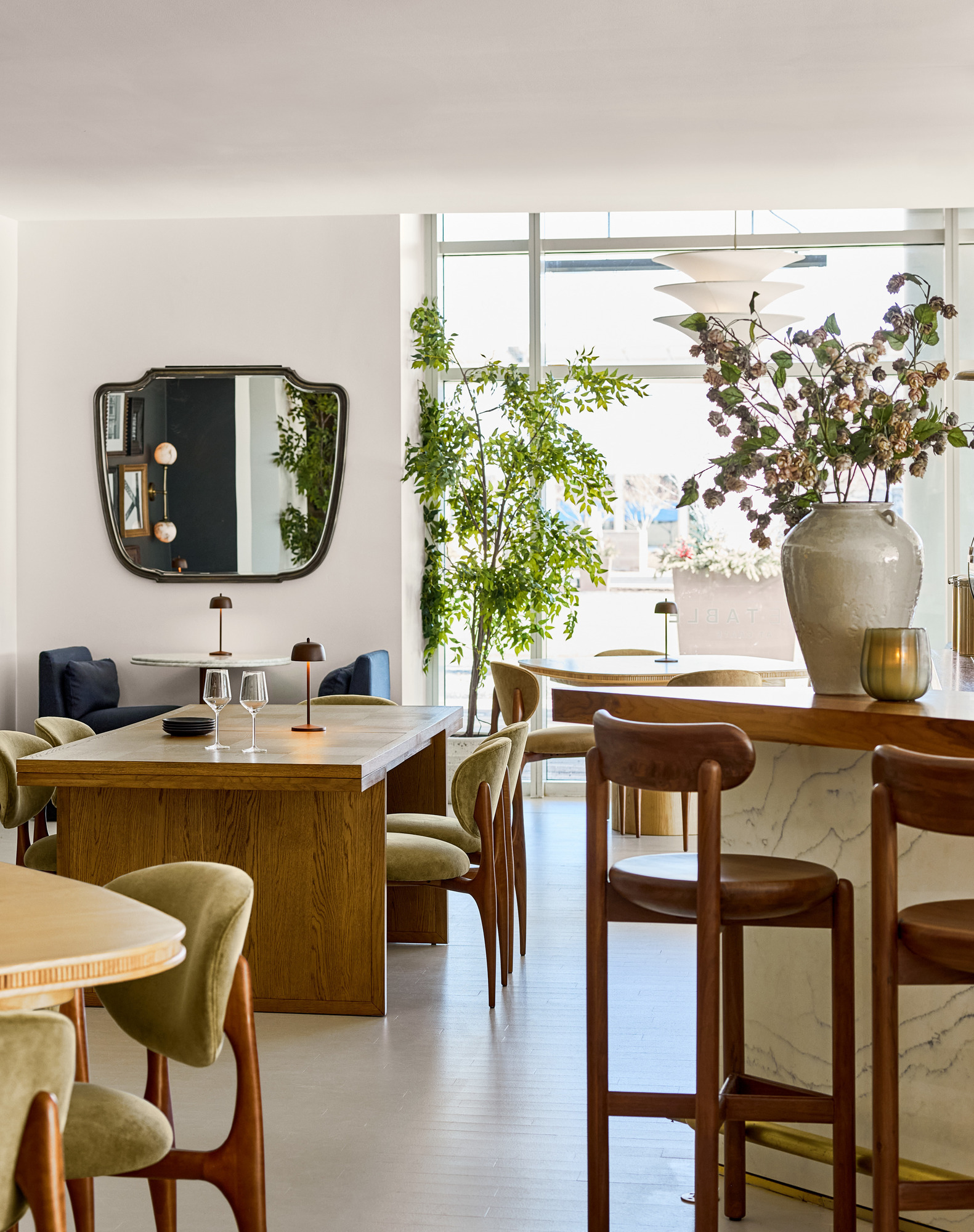 a room with tables and chairs