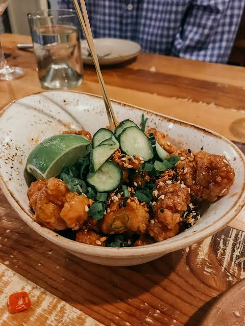 Signature small plates at Orchard City Kitchen, AI generated