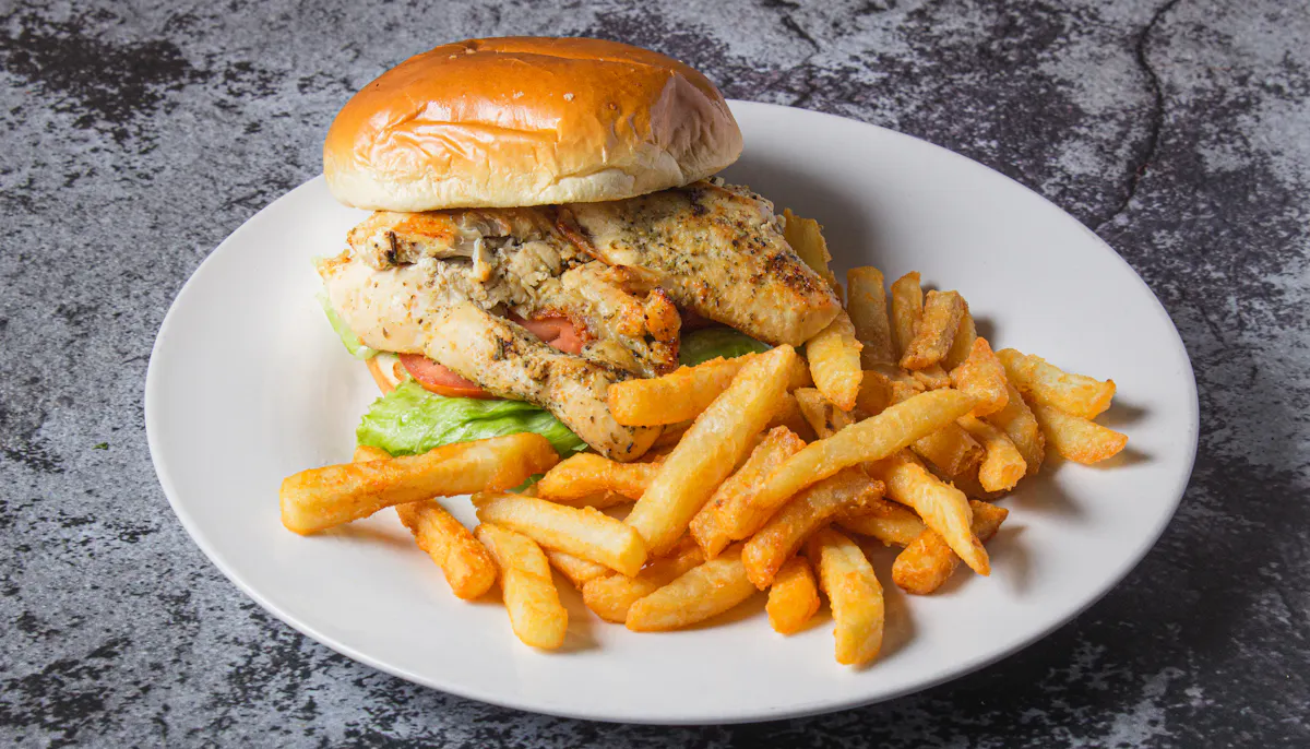 a chicken sandwich with fries