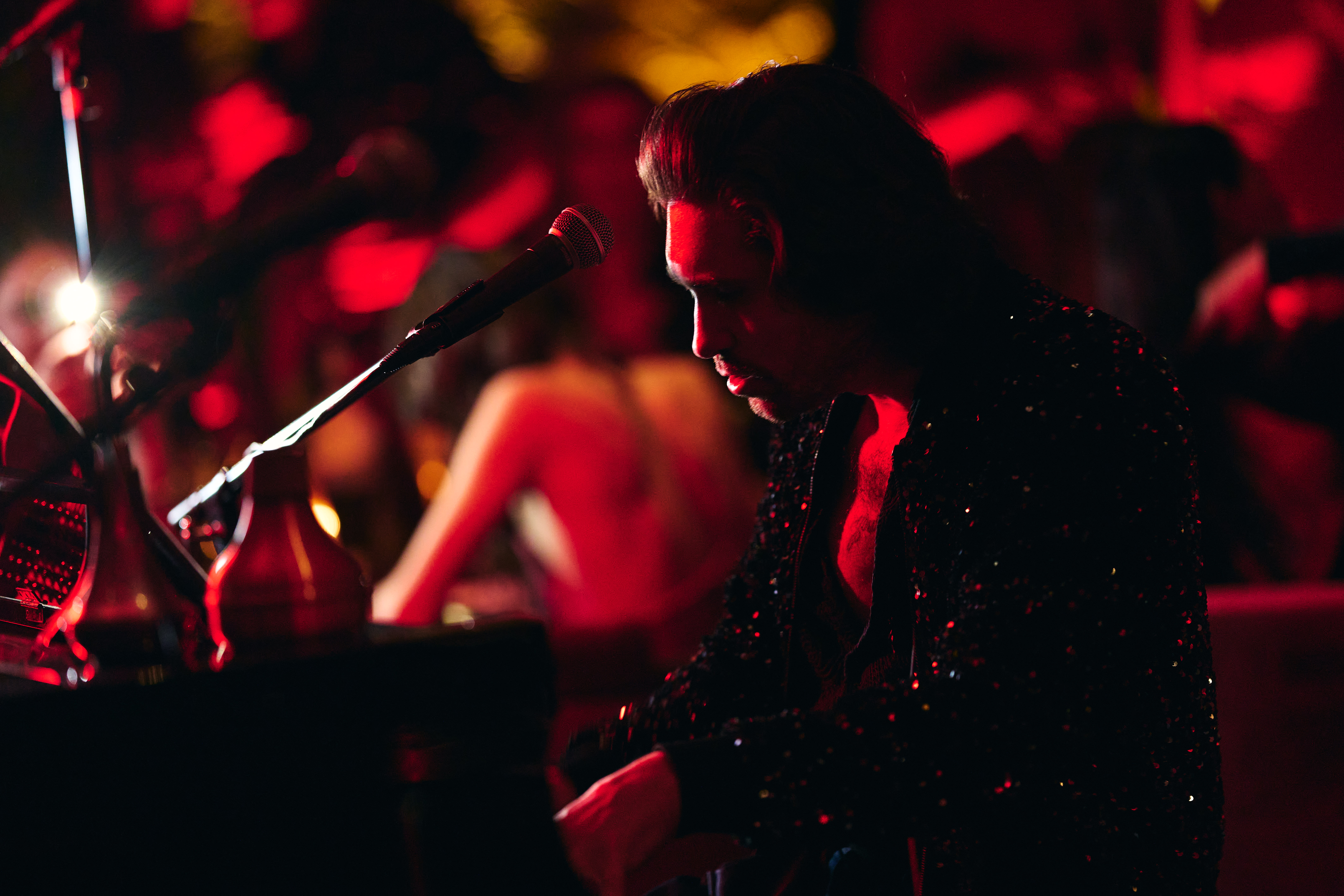 a person sitting in a dark room