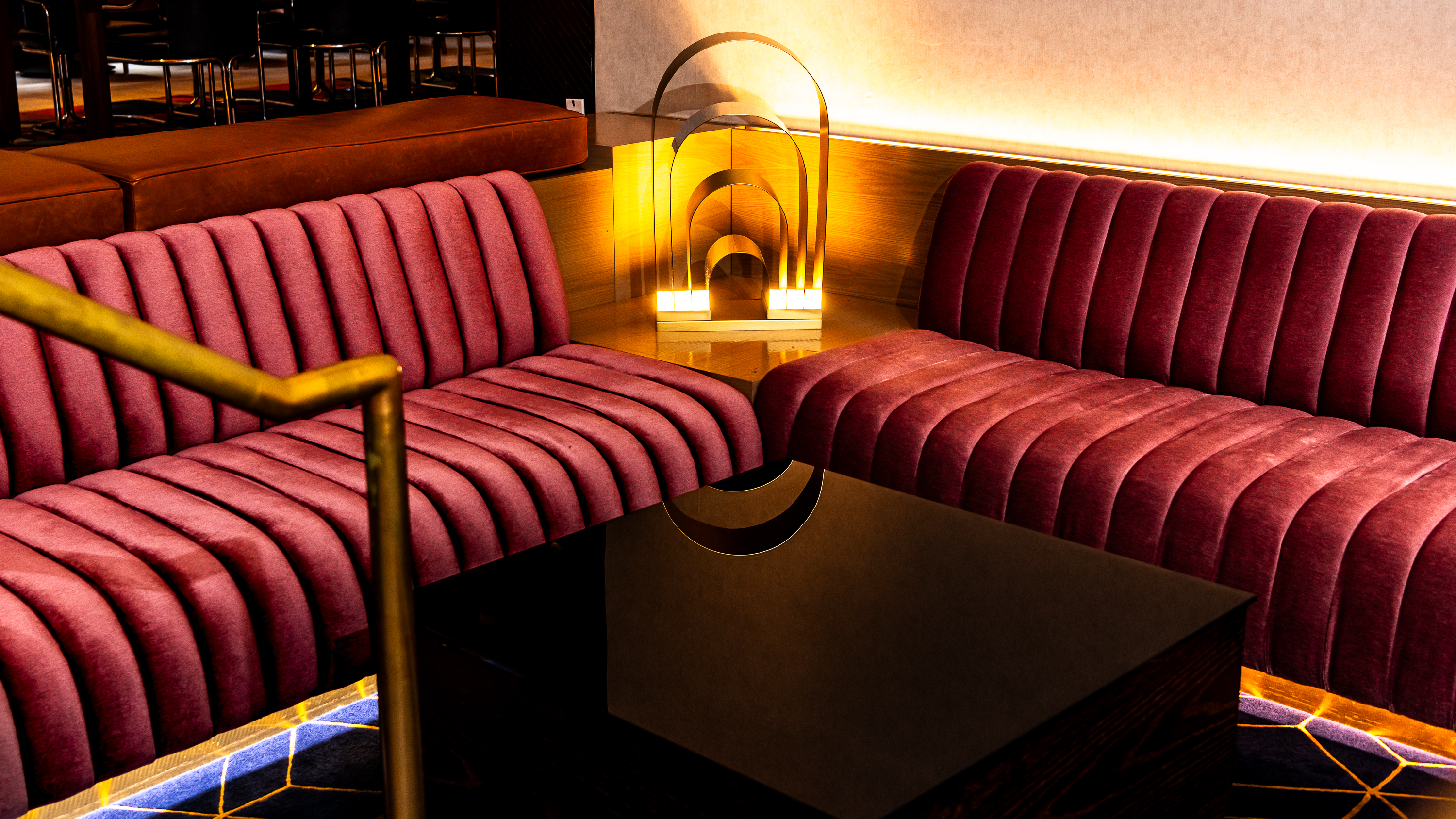 a living room with a couch and a chair