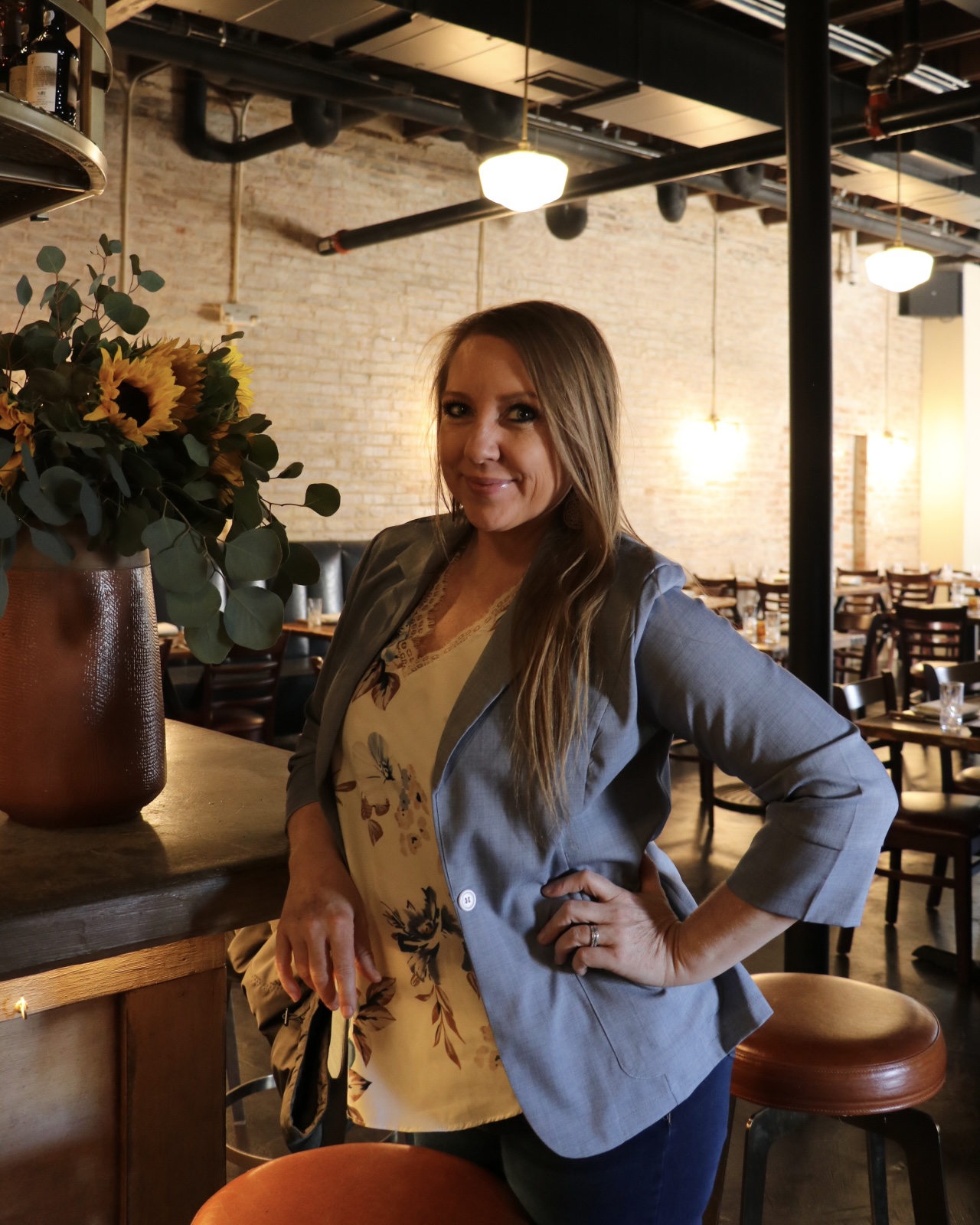 a person standing in a kitchen