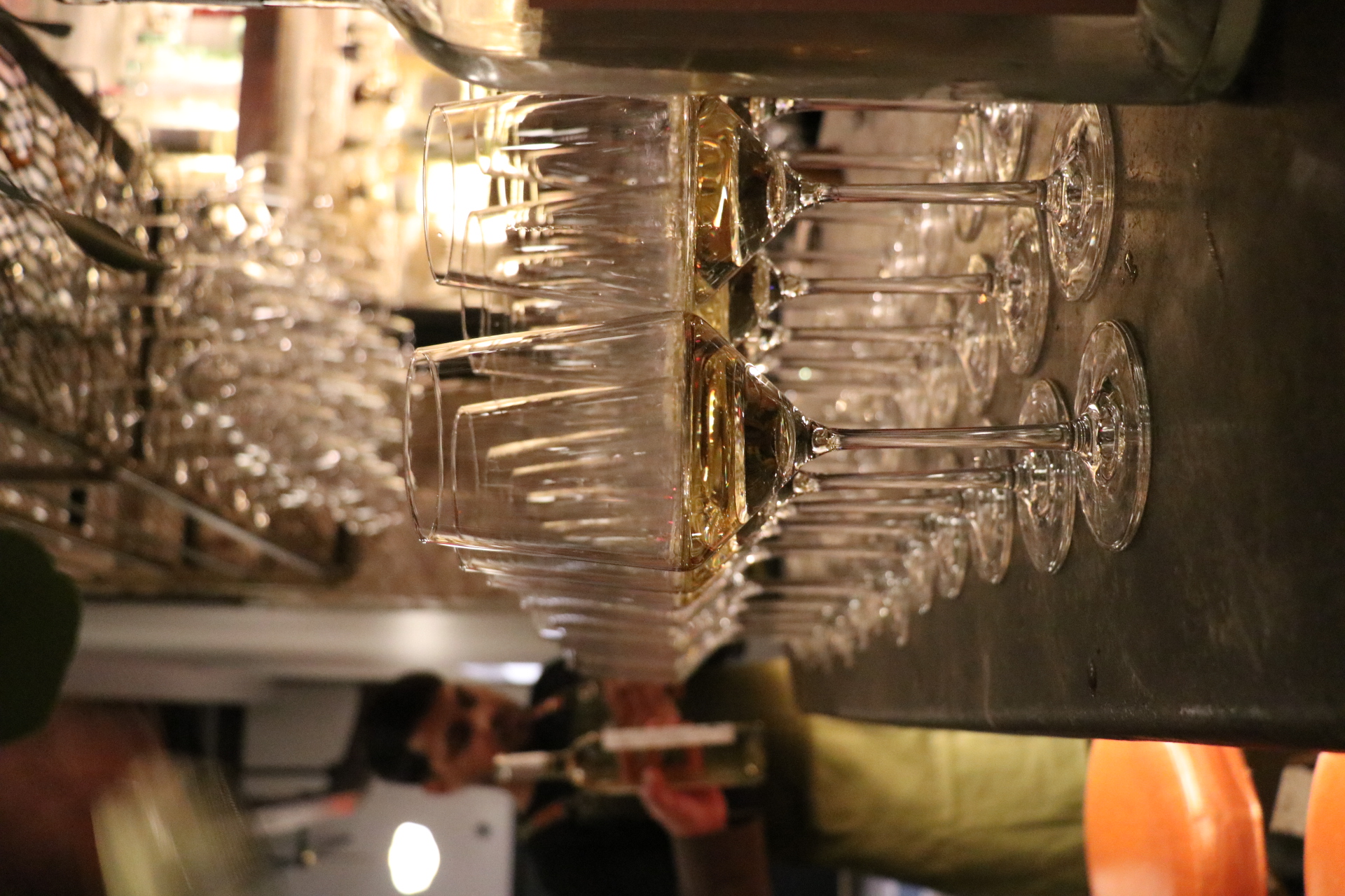 a glass filled with wine glasses