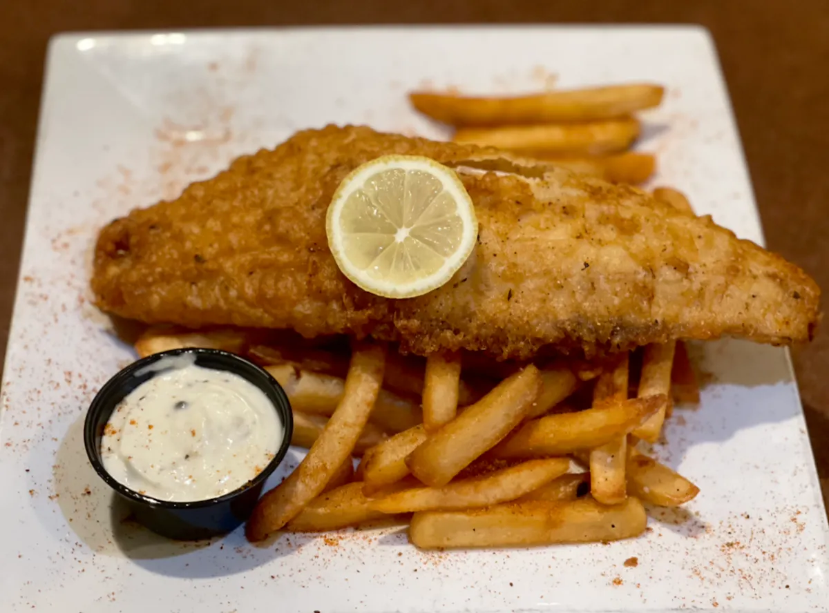 a sandwich and fries on a plate