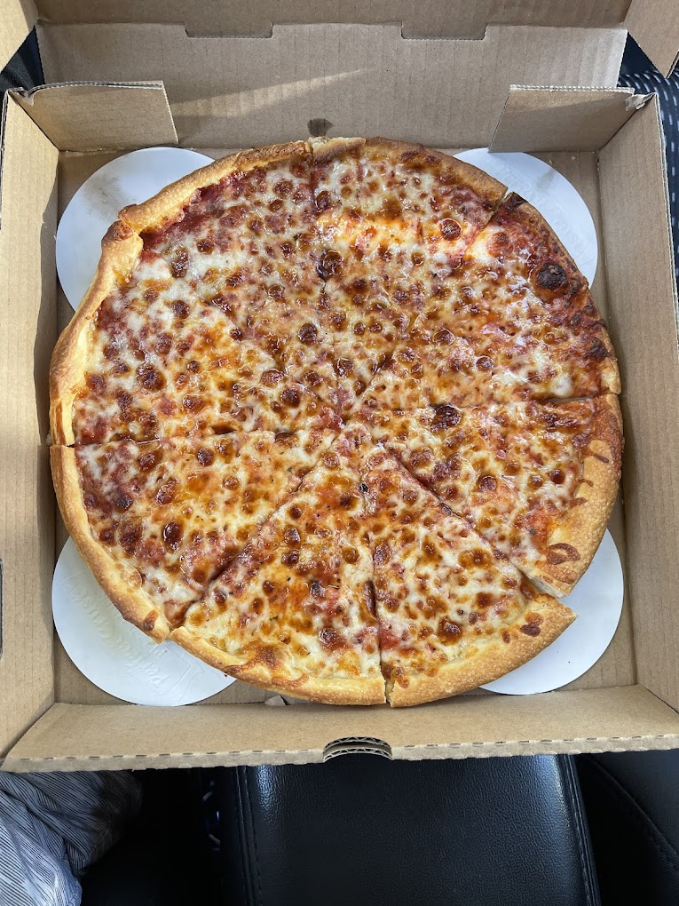a pizza sitting on top of a box