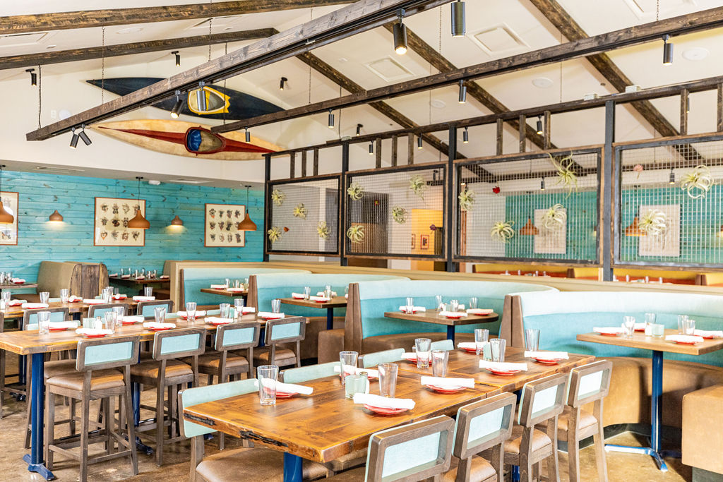 a group of people sitting at a table