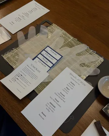 a table with gloves and menus