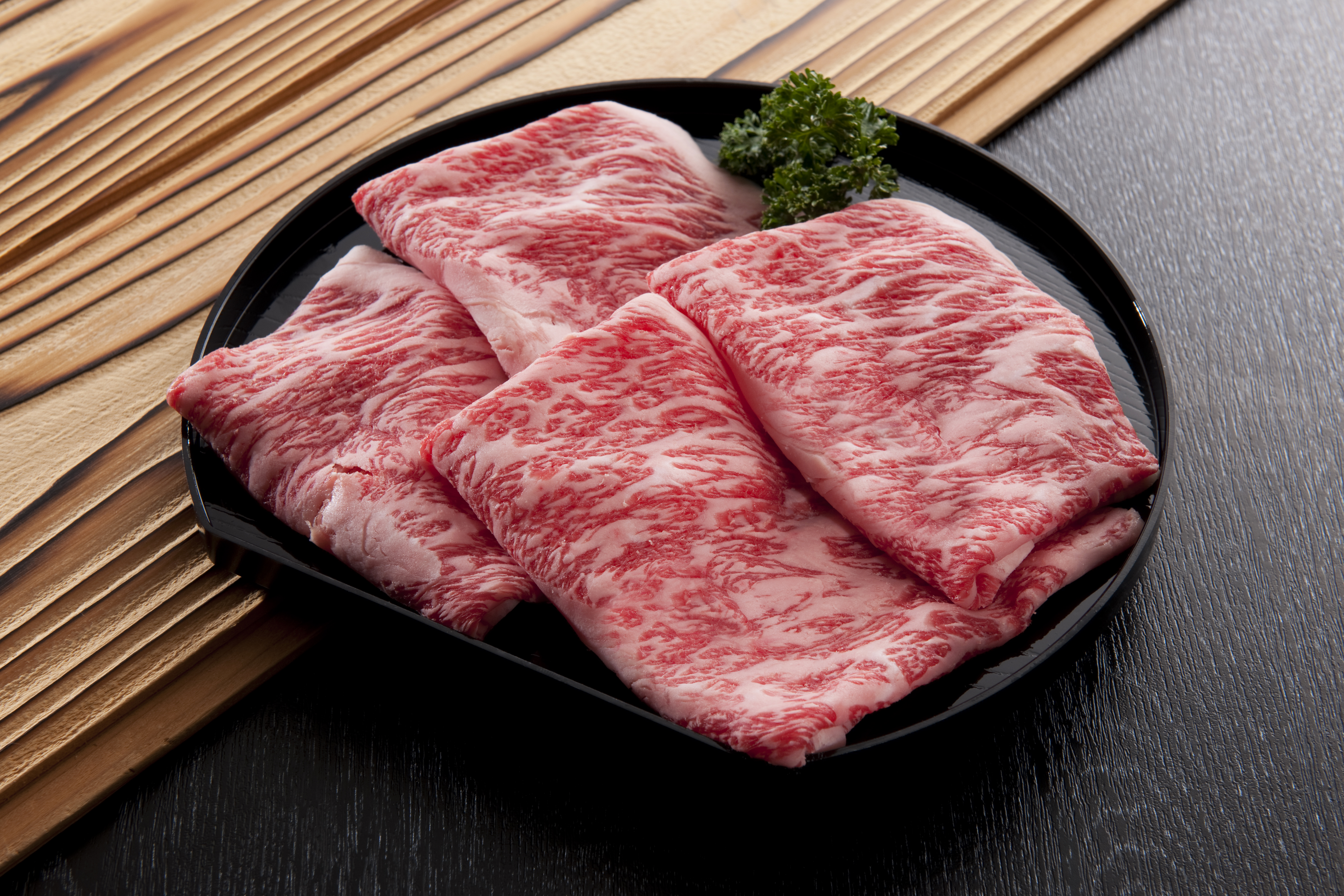 a slice of pizza sitting on top of a table