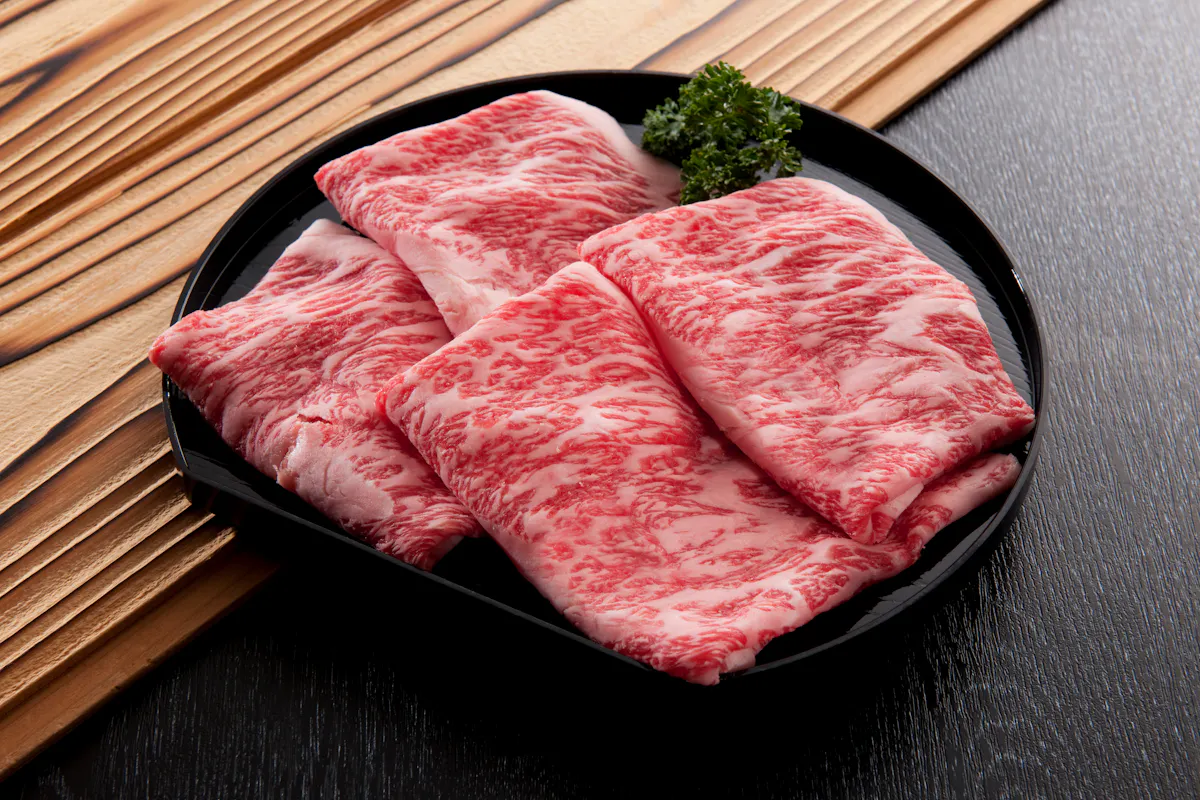 a slice of pizza sitting on top of a table