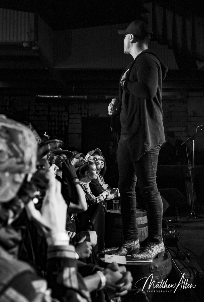 a group of people standing in front of a crowd