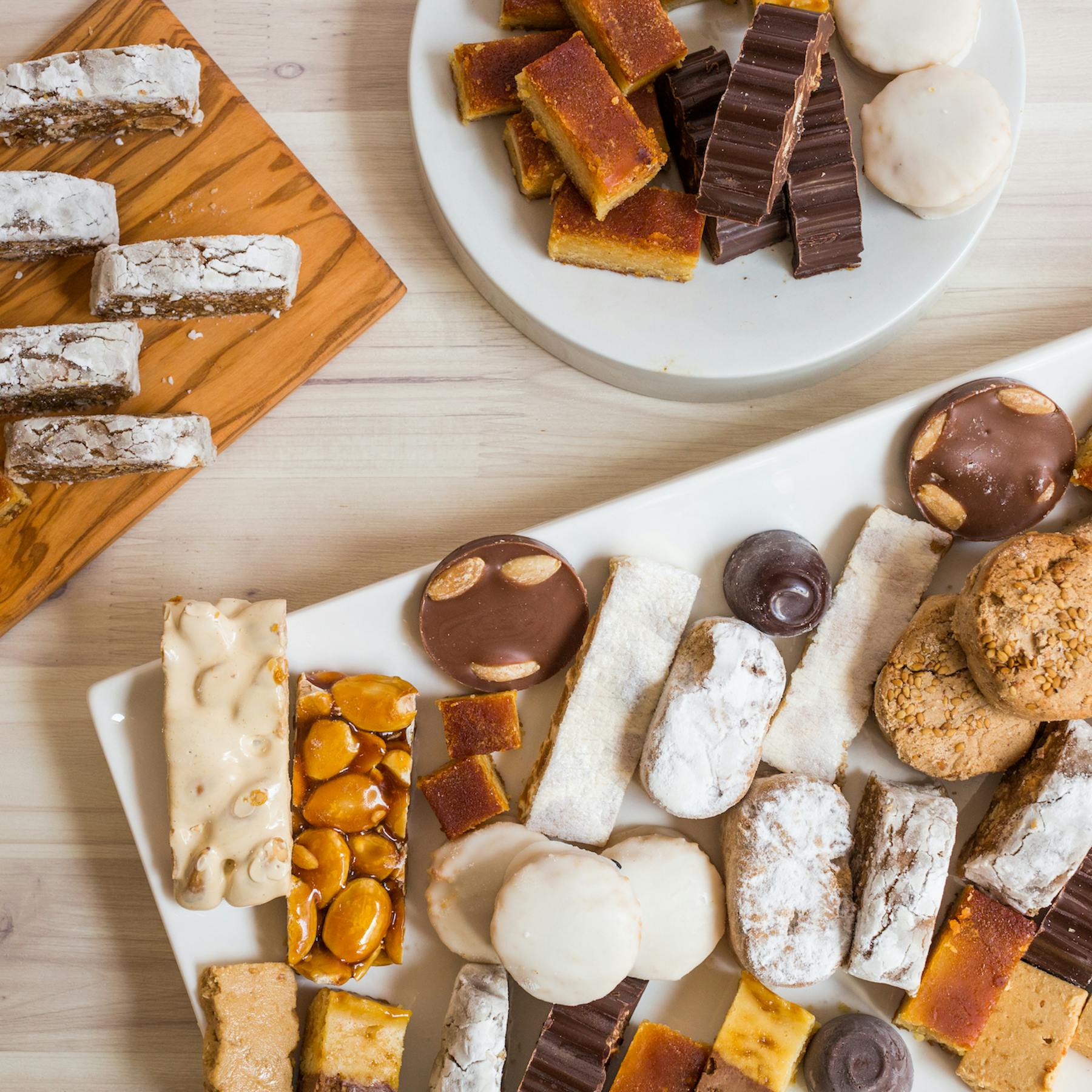 a bunch of food sitting on top of a wooden table