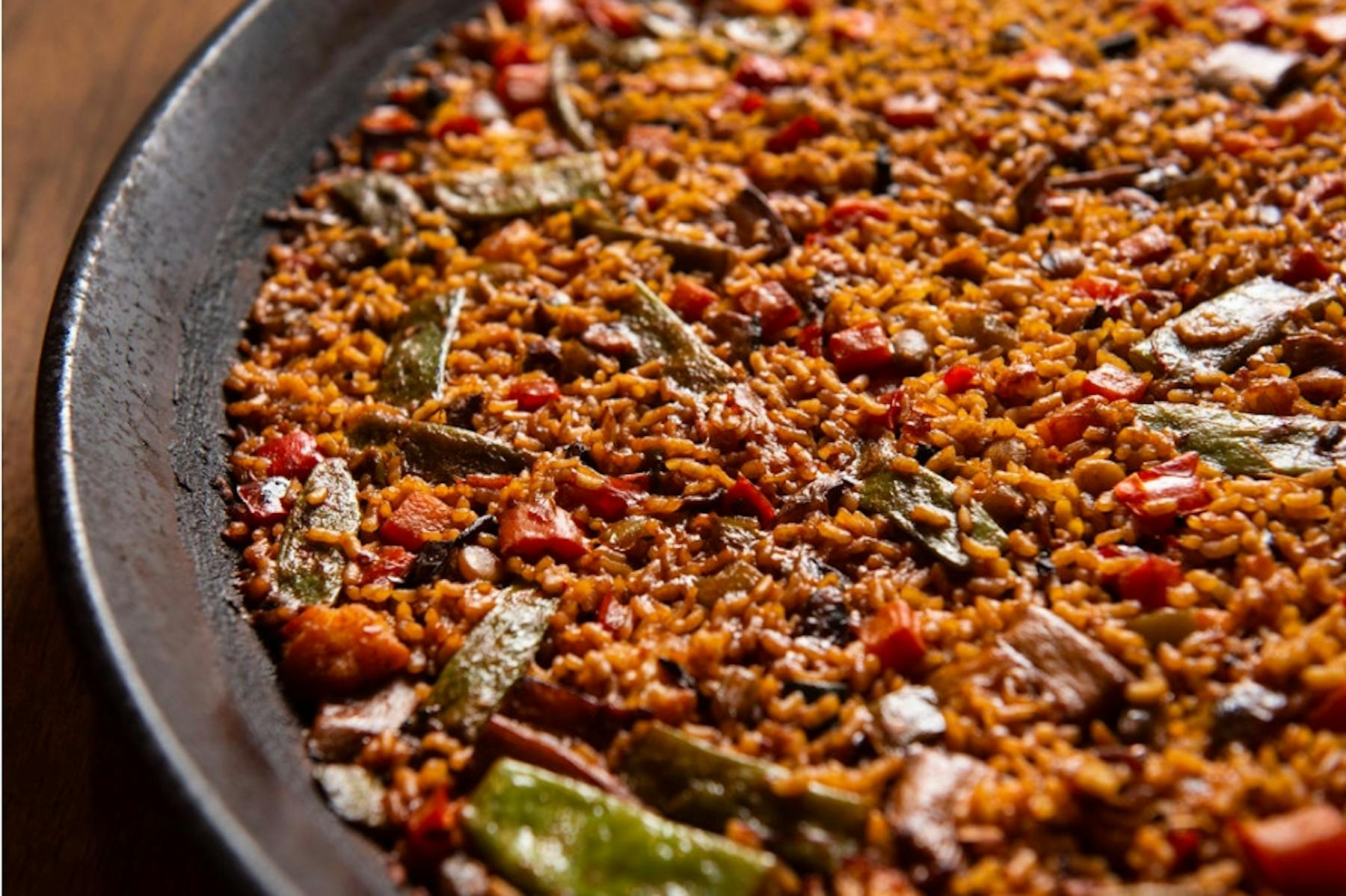 a close up of a paella