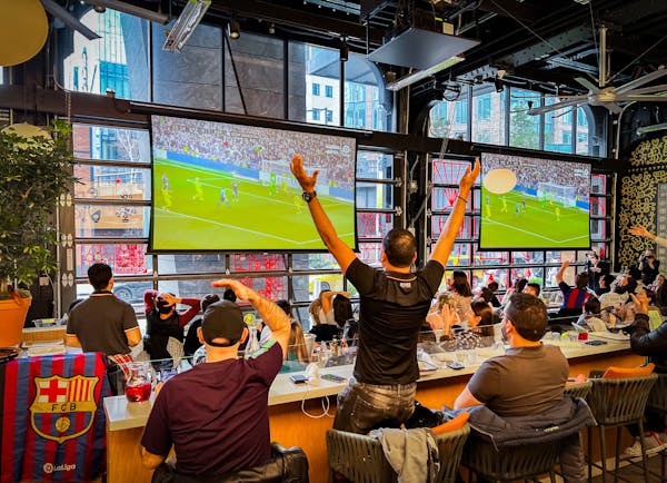 a group of people sitting at a table
