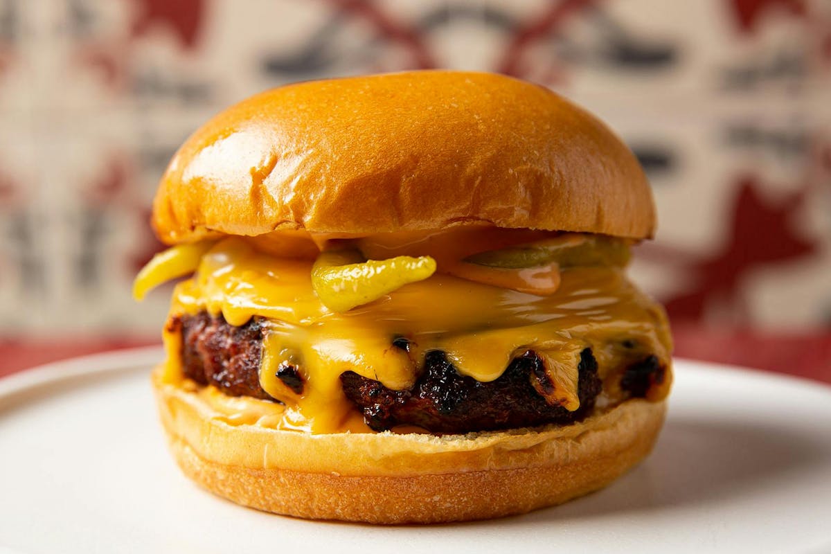 a close up of a burger