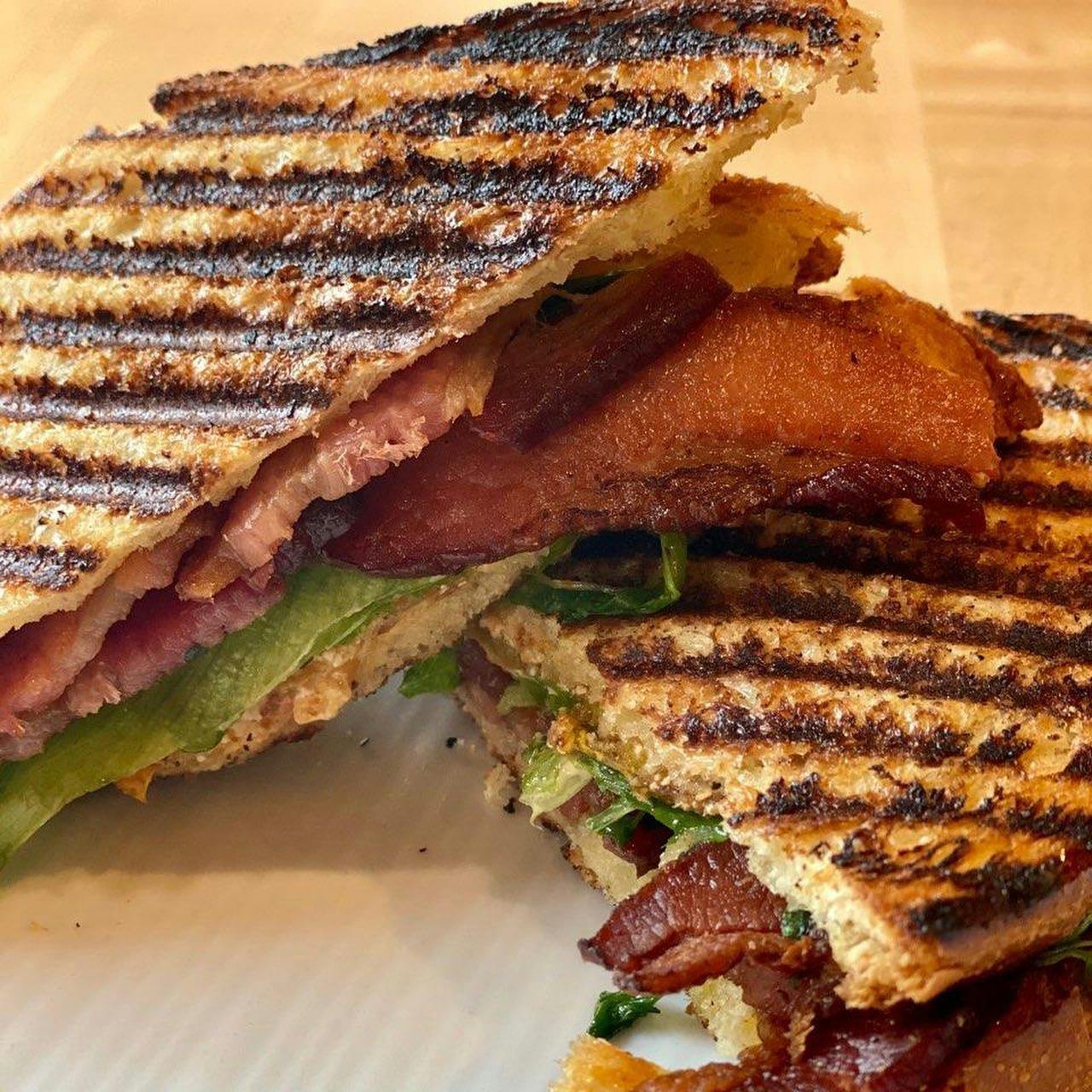 a sandwich cut in half on a plate