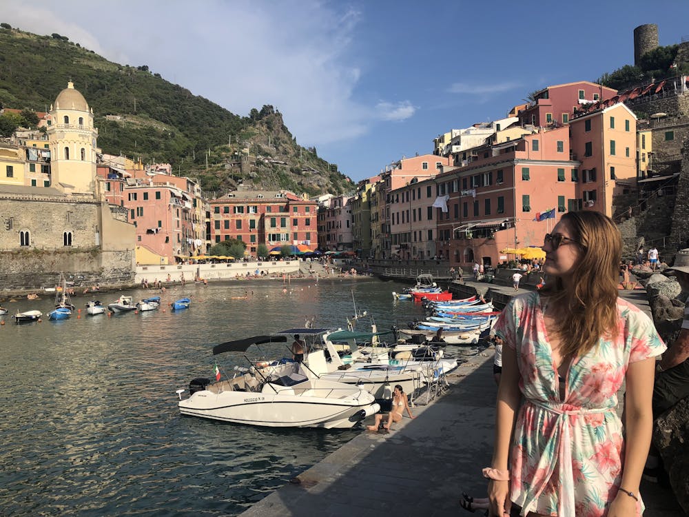 a person standing in a harbor