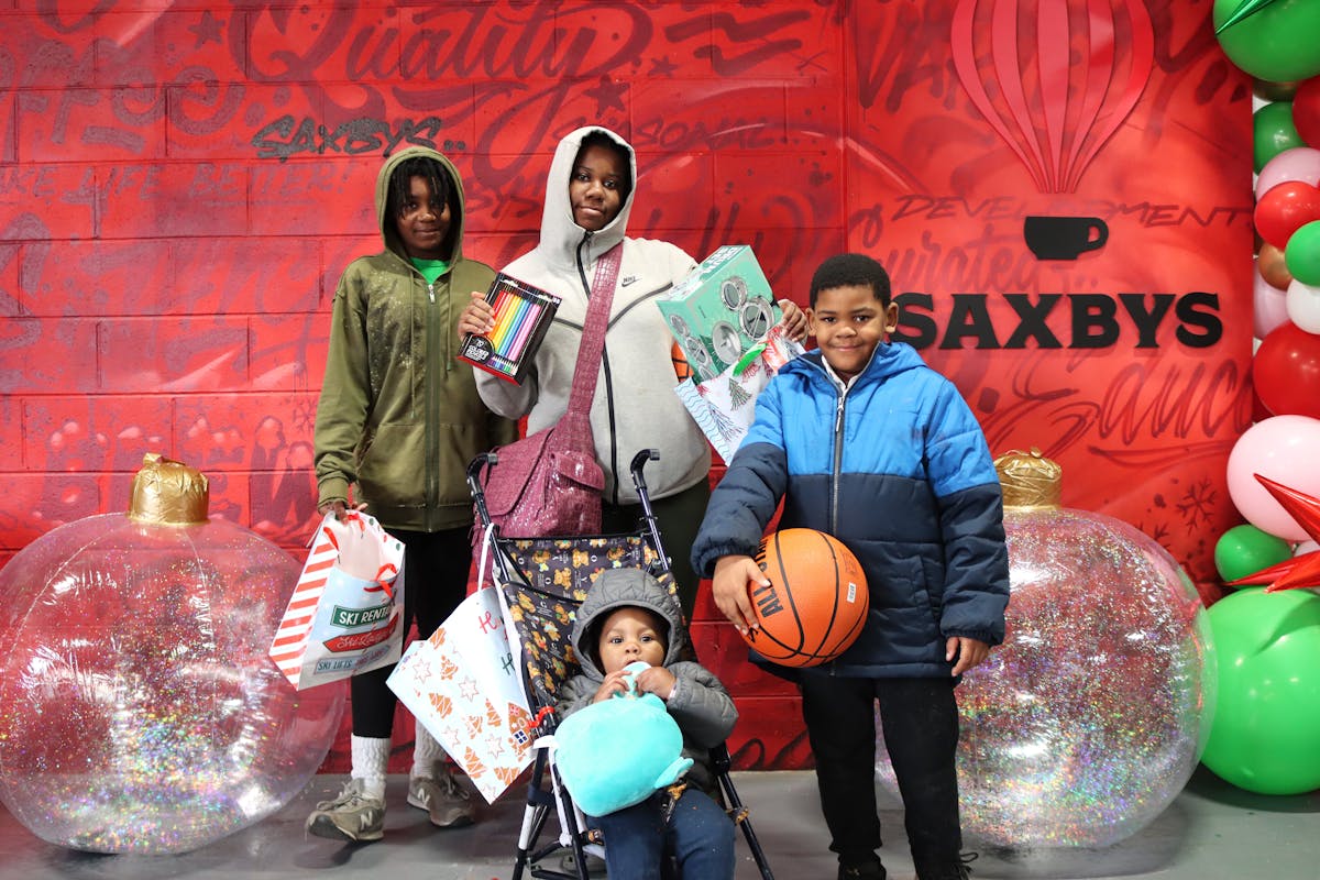 a group of people posing for the camera