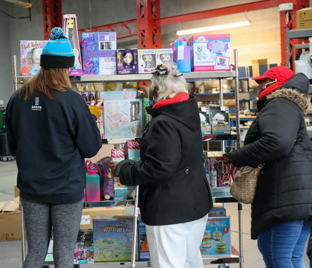 a woman standing in front of a store