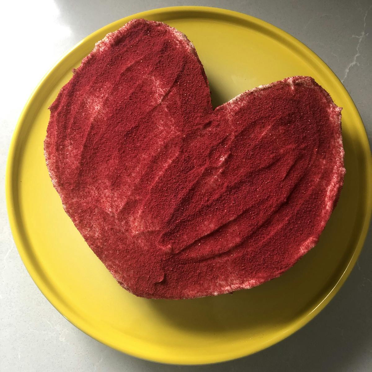 a close up of a heart shaped cake