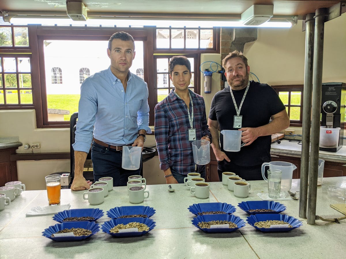 Nick Bayer (Founder & CEO), Russ Wilkin (VP of Marketing) & David Amos (VP of Coffee) cupping decaf coffee in Manizales