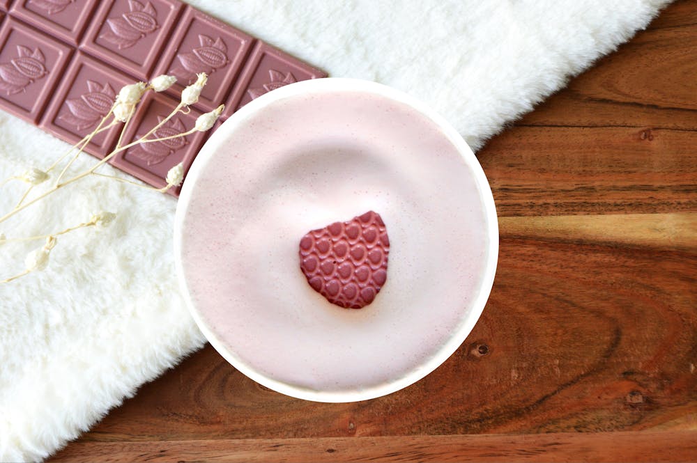a piece of cake sitting on top of a wooden table