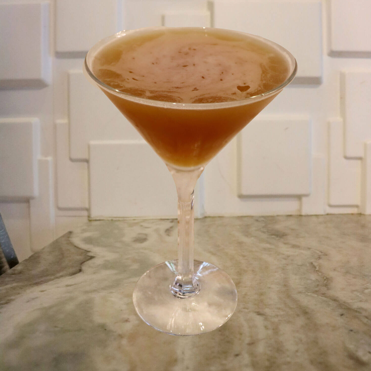 Amaretto, Triple Sec, and A Splash of Orange Juice