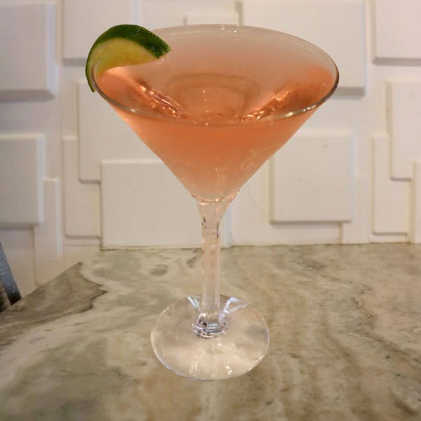 Deep Eddy Lemon Vodka, Triple Sec, Lime Juice, and a Splash of Cranberry Juice. Garnished With a Lime Slice