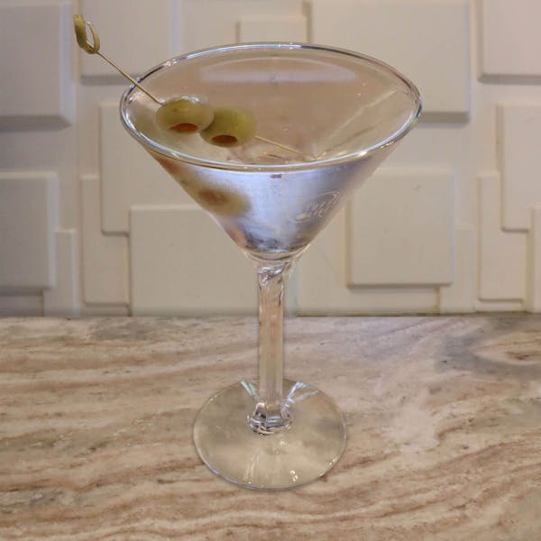 Premium Gin or Vodka, Dry Vermouth. Garnished with A Lemon Twist or Your Choice of Stuffed Olives